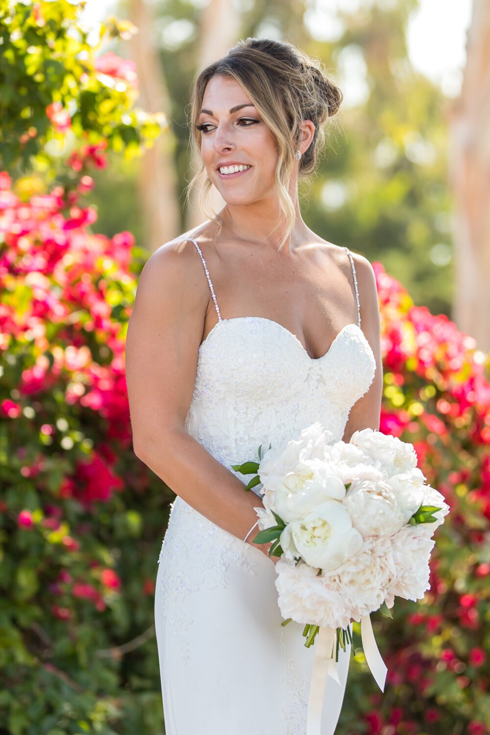www.santabarbarawedding.com | Elizabeth Victoria | SB Wedding Coordinator | Pacwest Blooms | Enzoani | Cheek to Cheek Artistry | The Bustle | Bride with Bouquet in Front of Bright Pink Flowers