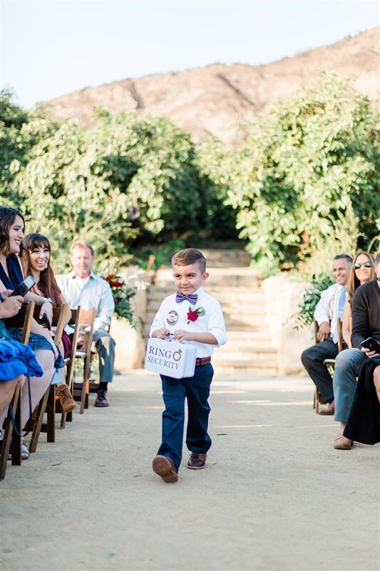 www.santabarbarawedding.com | Events by M and M | Anne Marie Studios | Ocean View Farm | Unique Floral Designs | A-Rental Connection | Ring Bearer Walking Down the Aisle