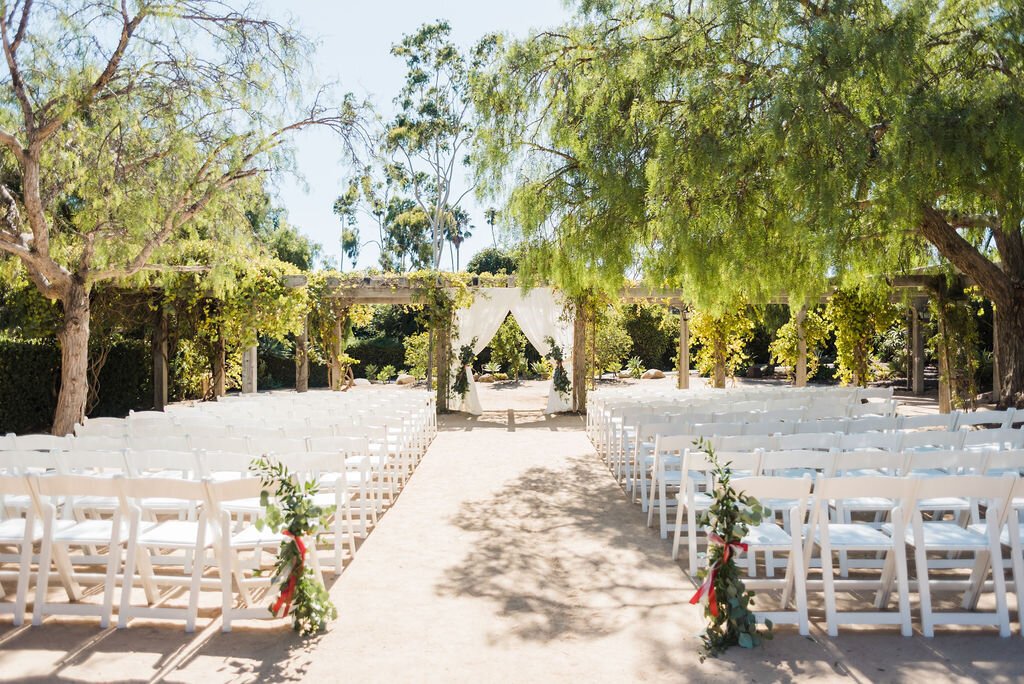 www.santabarbarawedding.com | Julie Shuford Photography | Alexis Ireland Florals | Ceremony Wedding Aisle Decor with Trees Covering the Chairs