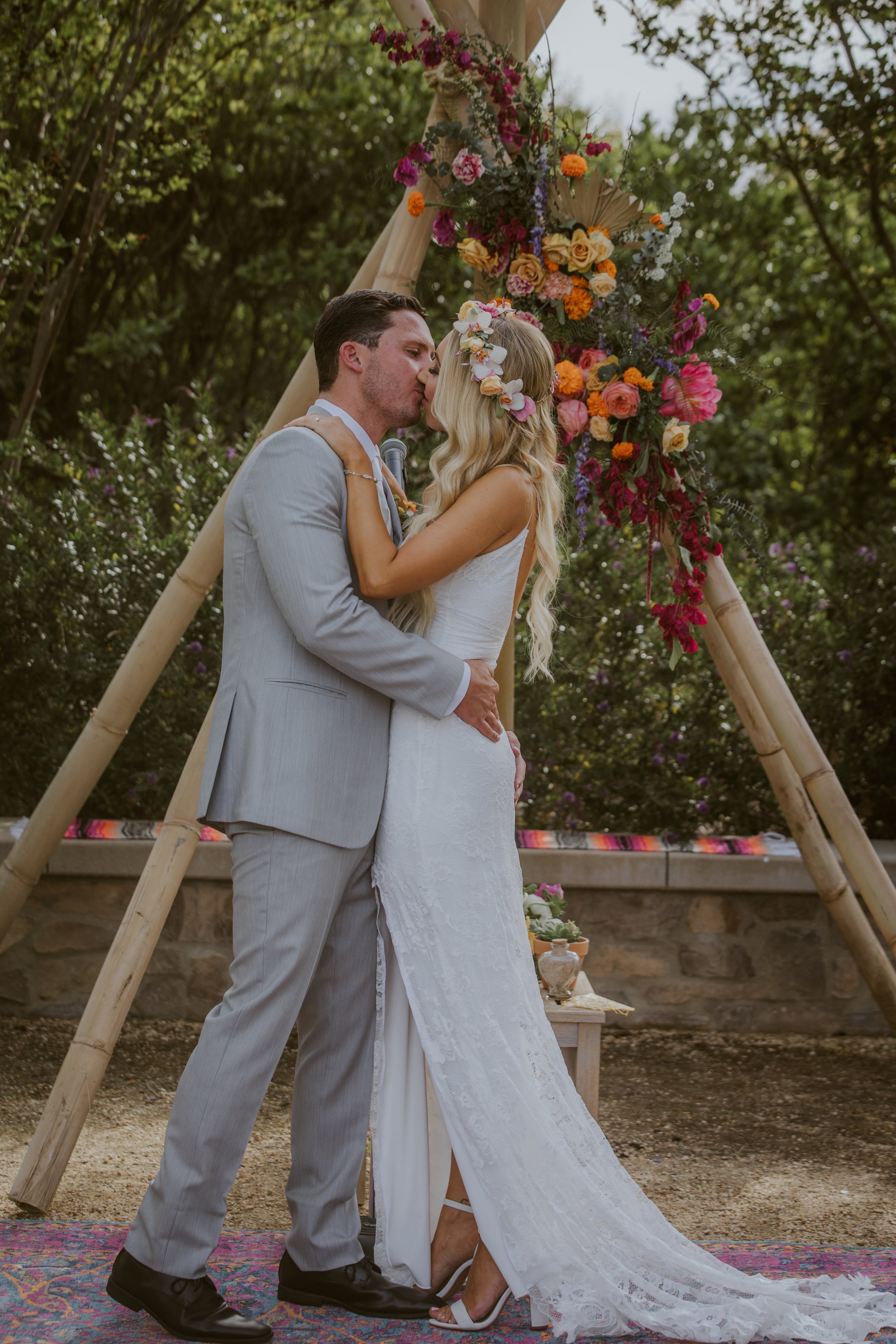 www.santabarbarawedding.com | Burgundy Blue | Ventura Rentals | Fleur De Rye | Casey Robinson Makeup | Couple Shares a Kiss