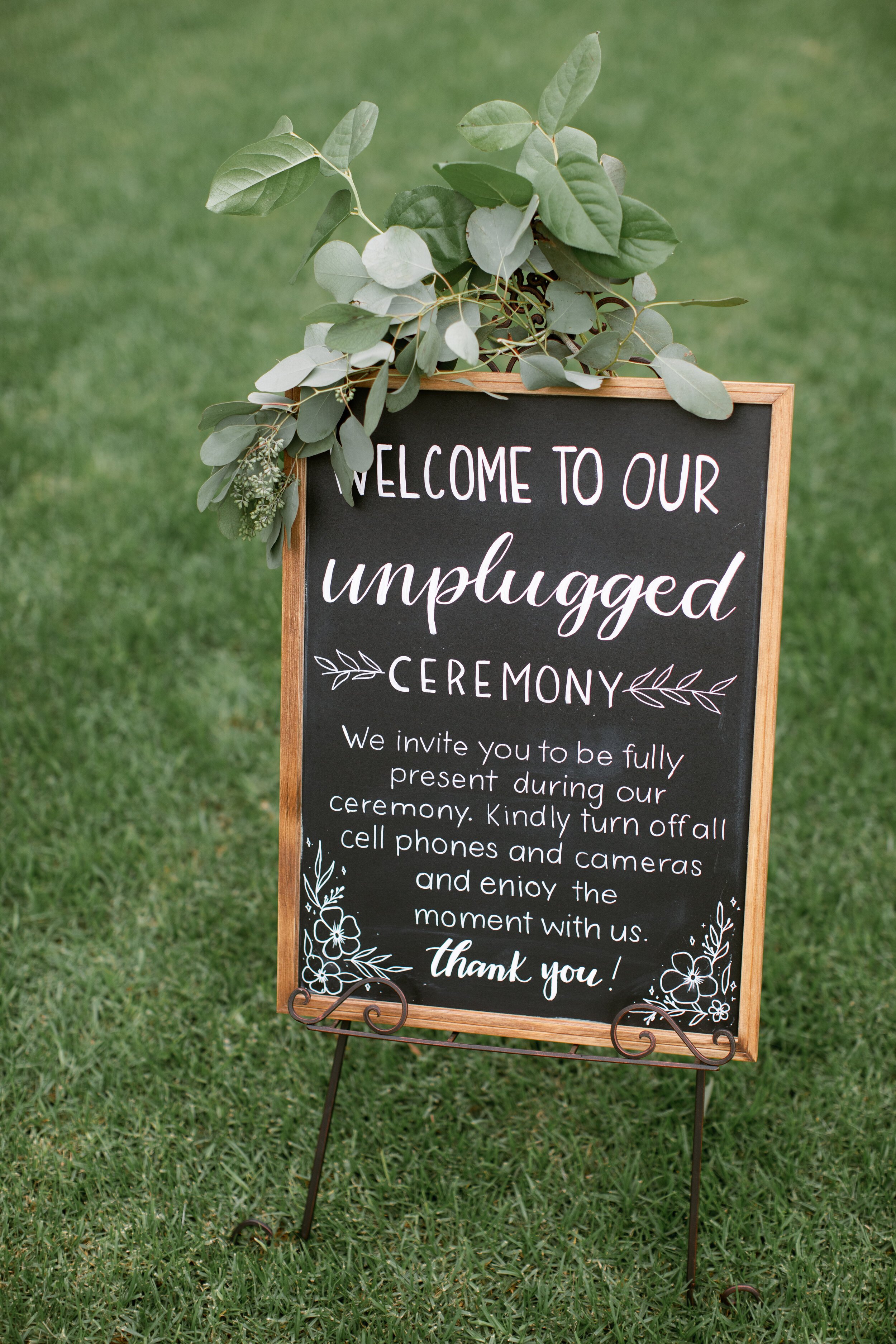 www.santabarbarawedding.com | Events by Fran | Chase Palm Park | Anna Delores Photography | Tangled Lotus | Santa Barbara Chairs | Wedding Sign at Ceremony 