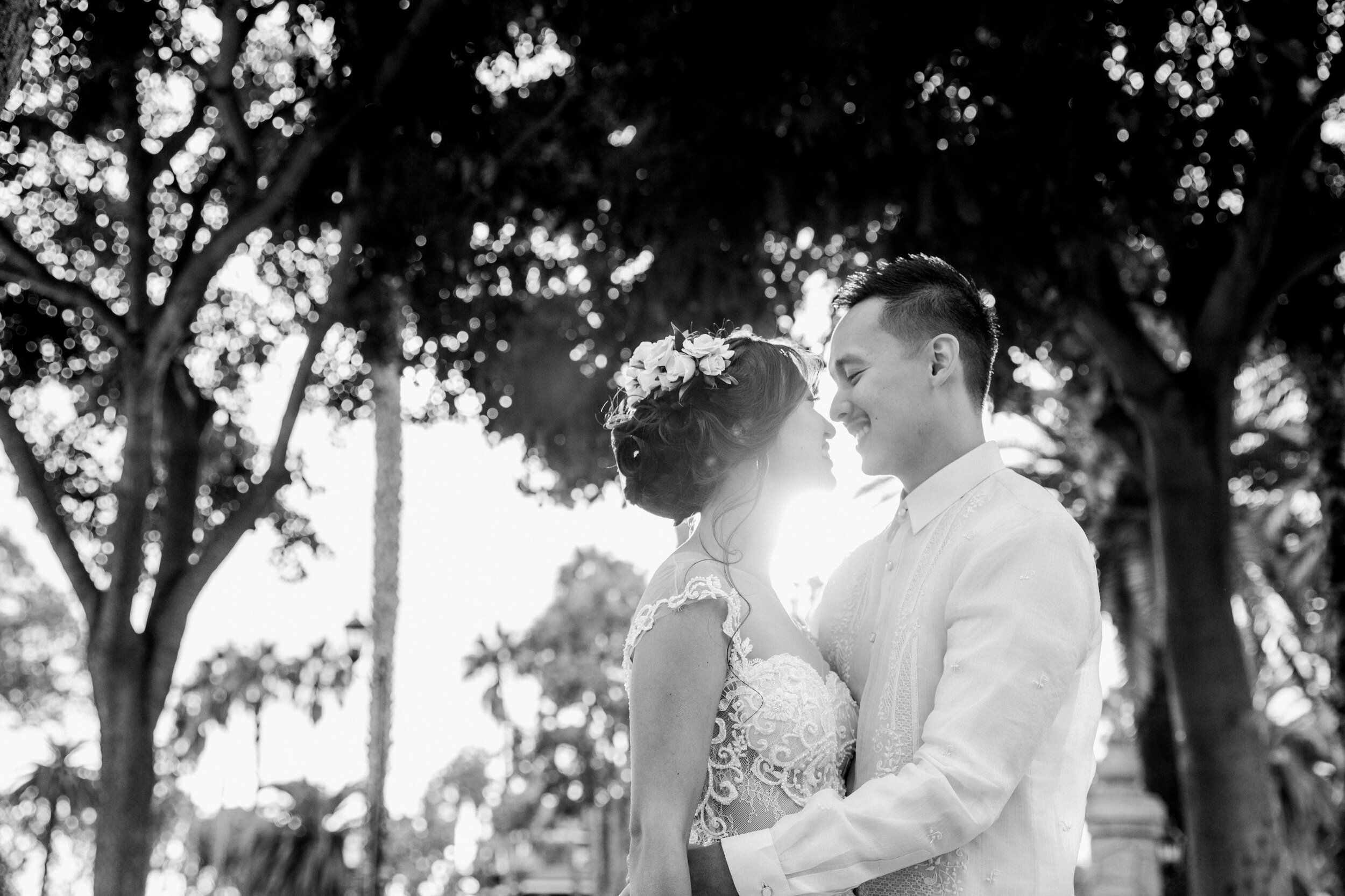 www.santabarbarawedding.com | Events by Fran | Chase Palm Park | Anna Delores Photography | Tangled Lotus | Pineapple Industries | Mila Bridal | Joel Sebastian | Couple with Sun Behind Them