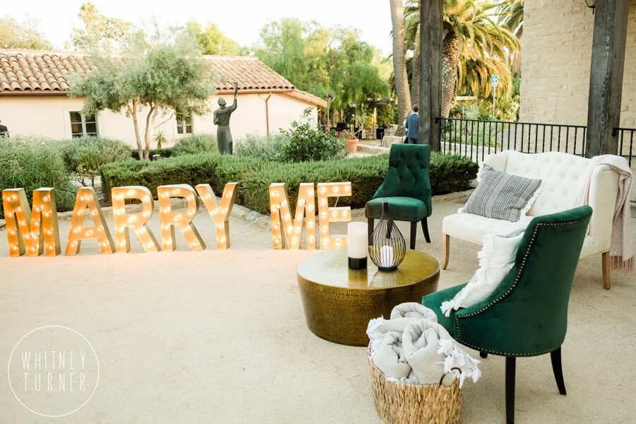 www.santabarbarawedding.com | Ventura Rental Party & Events | Green and White Lounge Furniture with Marry Me Sign
