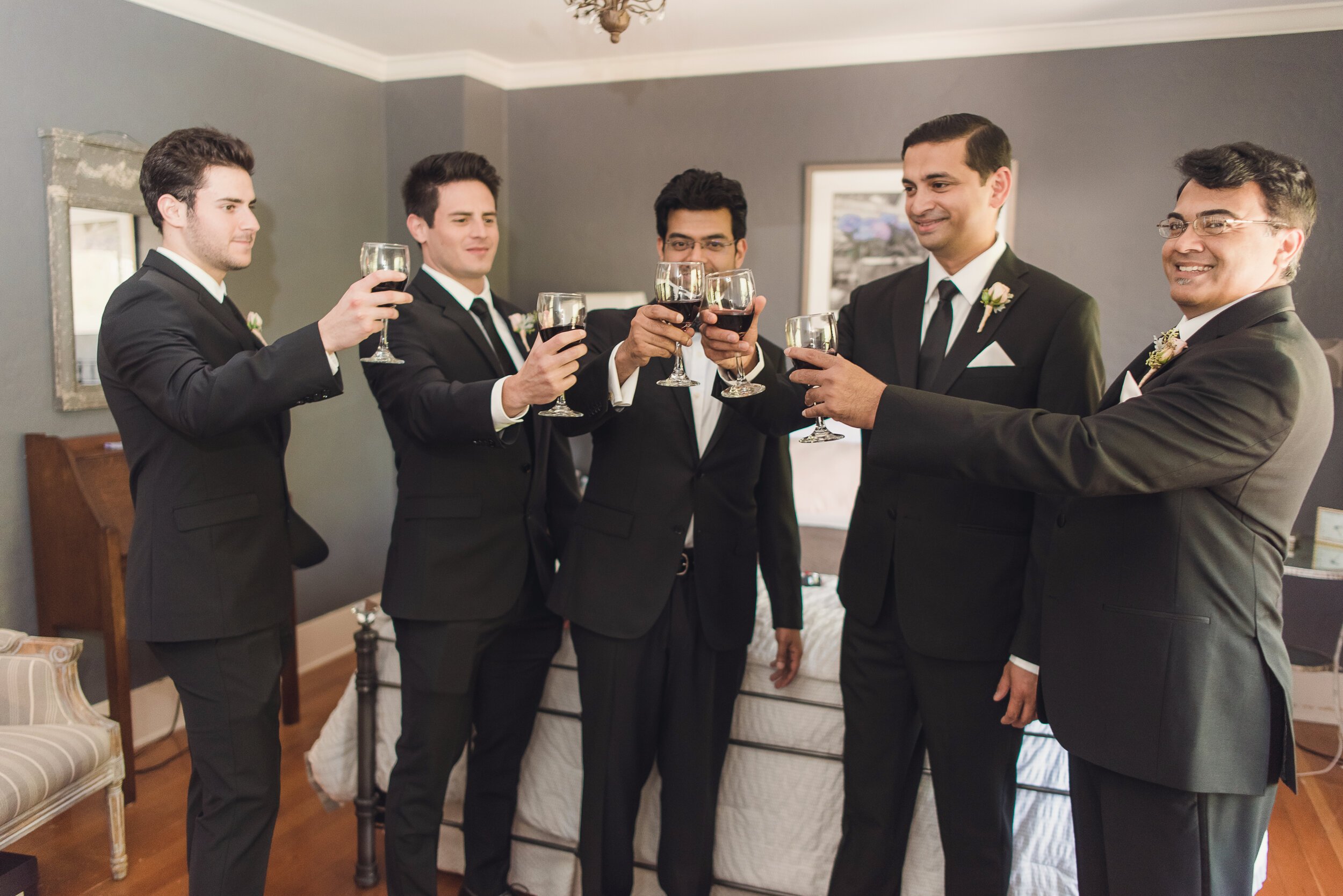 www.santabarbarawedding.com | Lavender Inn | Sun &amp; Sparrow | Jocelyn Kellogg | A Sunny Day Productions | Groom Sharing a Drink with His Groomsmen 