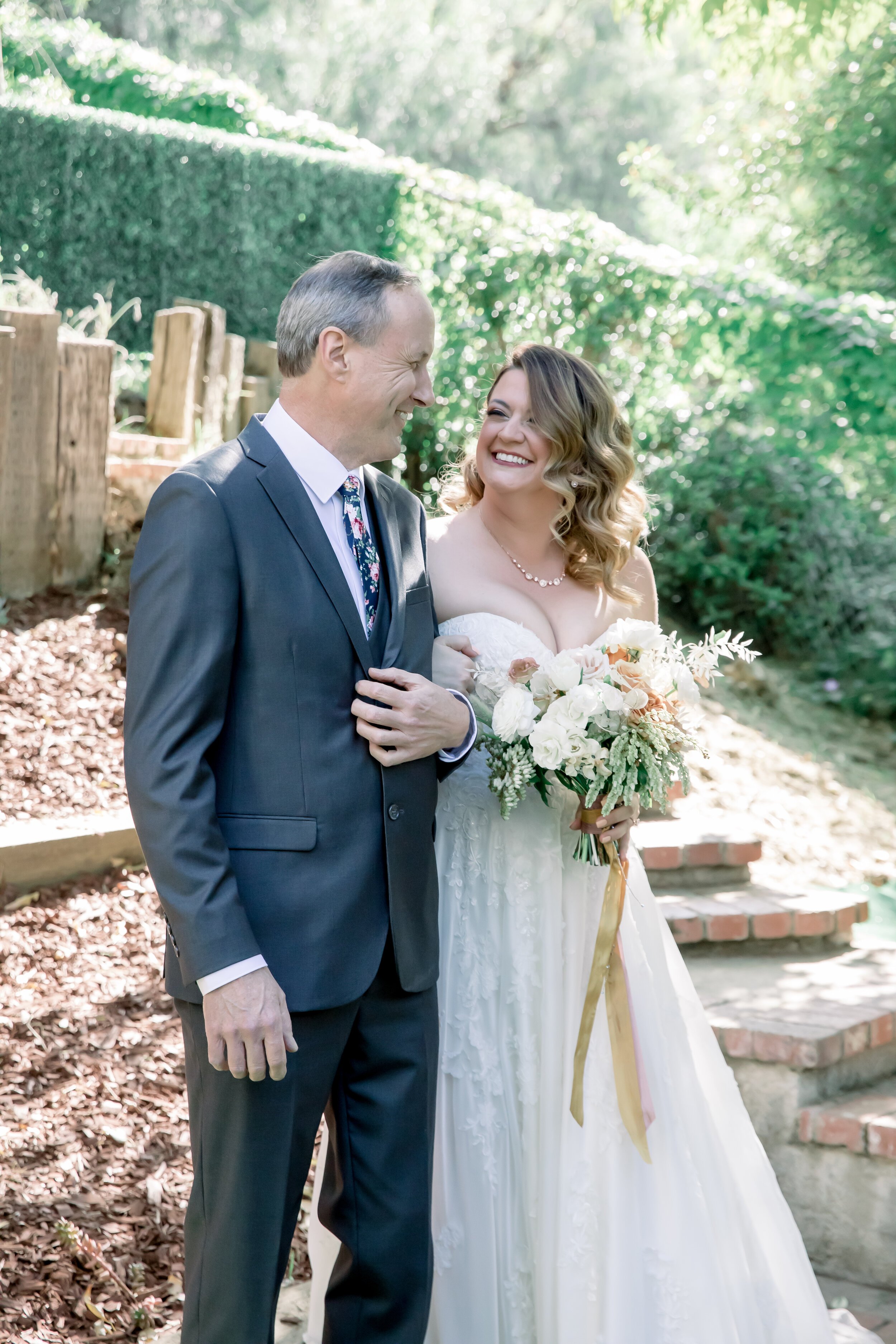 www.santabarbarawedding.com | Rewind Photography | Events by M and M | The Twisted Twig | A Rental Connection | Bliss Bridal Beauty | Bride Walking Into Ceremony with Her Father