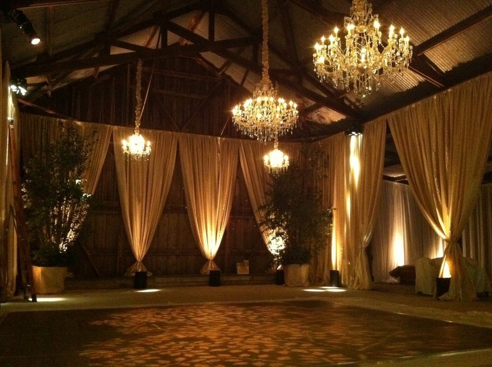 www.santabarbarawedding.com | Ambient Event Design | Chandeliers and Lighting on Drapes at the Reception