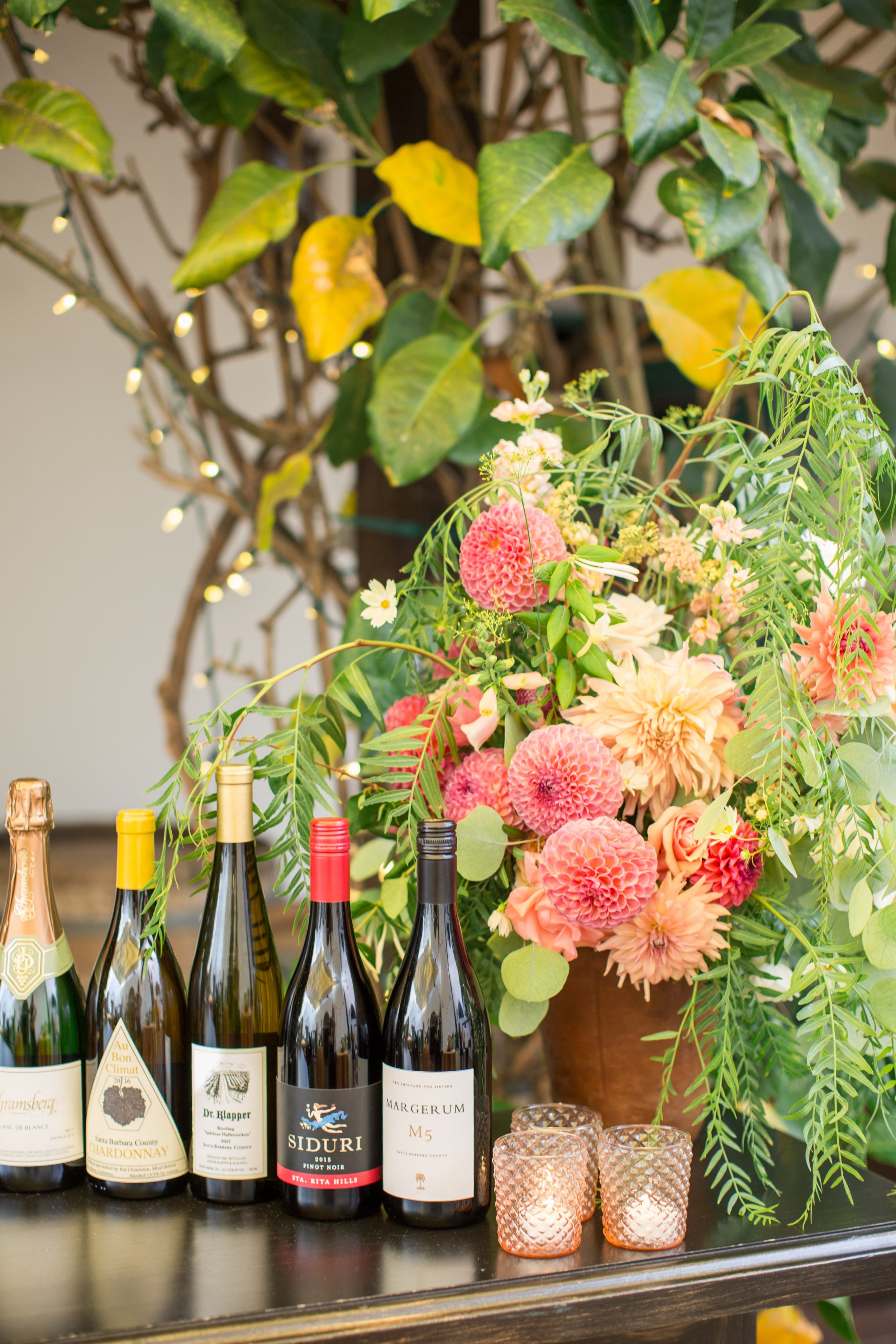 www.santbarbarawedding.com | Anna J Photography | Santa Barbara Courthouse | Selena Marie Weddings &amp; Events for Wedding Planning | Margaret Joan Florals | Wine and Flower Display at the Venue 