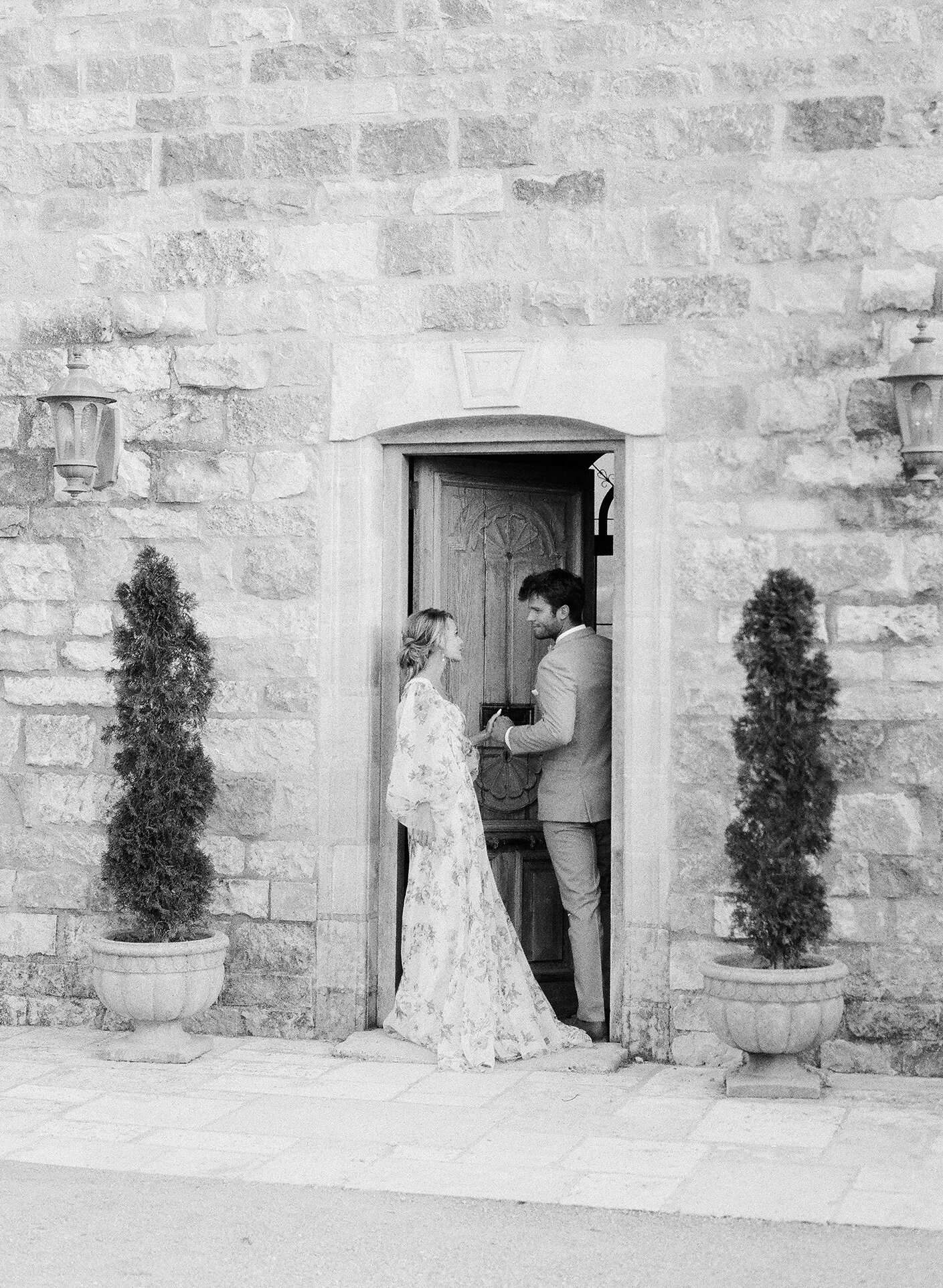 www.santabarbarawedding.com | Meg Sandu Photography | Sunstone Villa | Weddings by Susanne Dunne | Emblem Flowers | Monique Lhuillier | Page Beauty | Friar Tux | Couple in Doorway