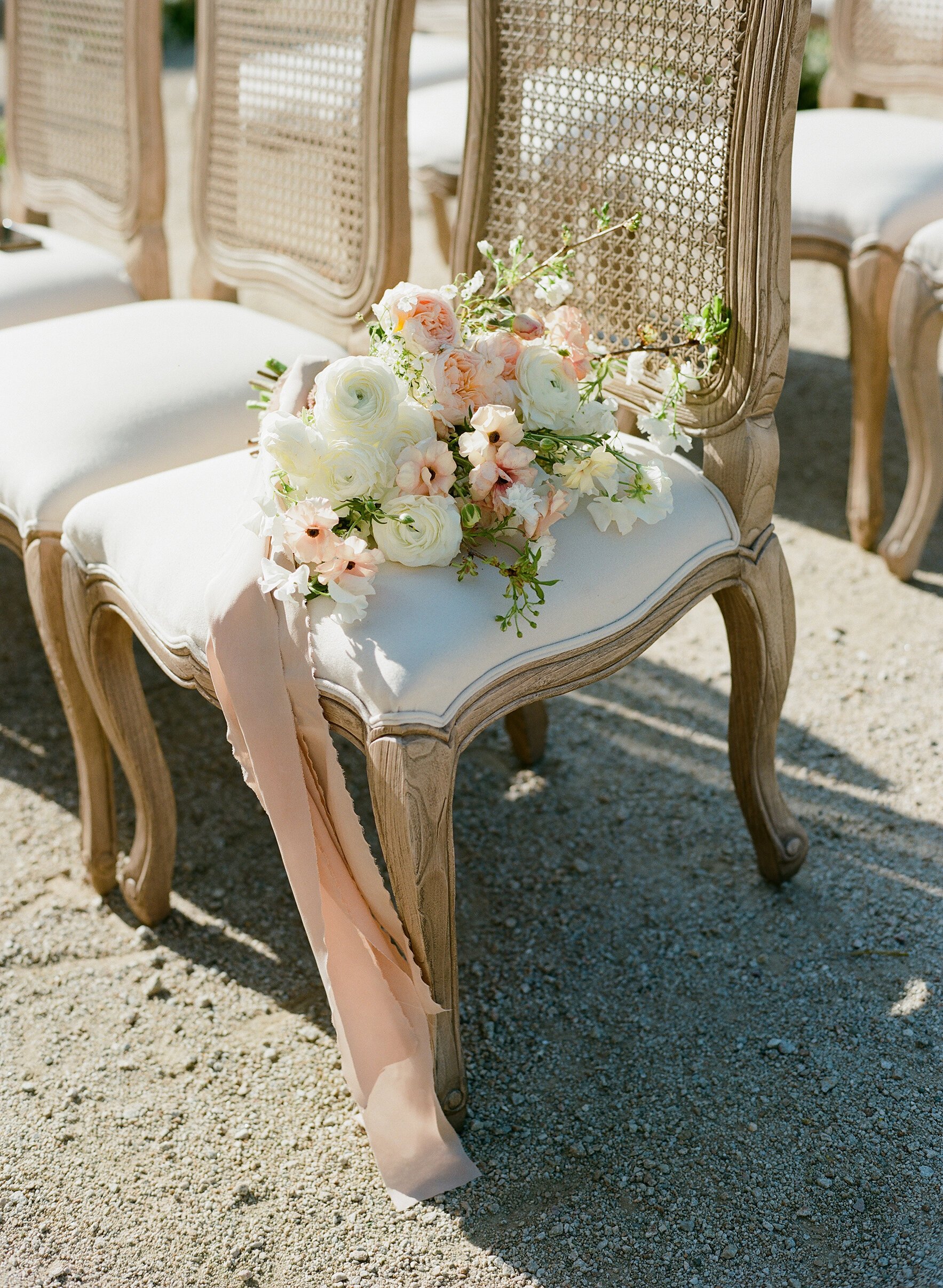 www.santabarbarawedding.com | Meg Sandu Photography | Sunstone Villa | Weddings by Susanne Dunne | Emblem Flowers | Bright Event Rentals | Bouquet on Ceremony Chair
