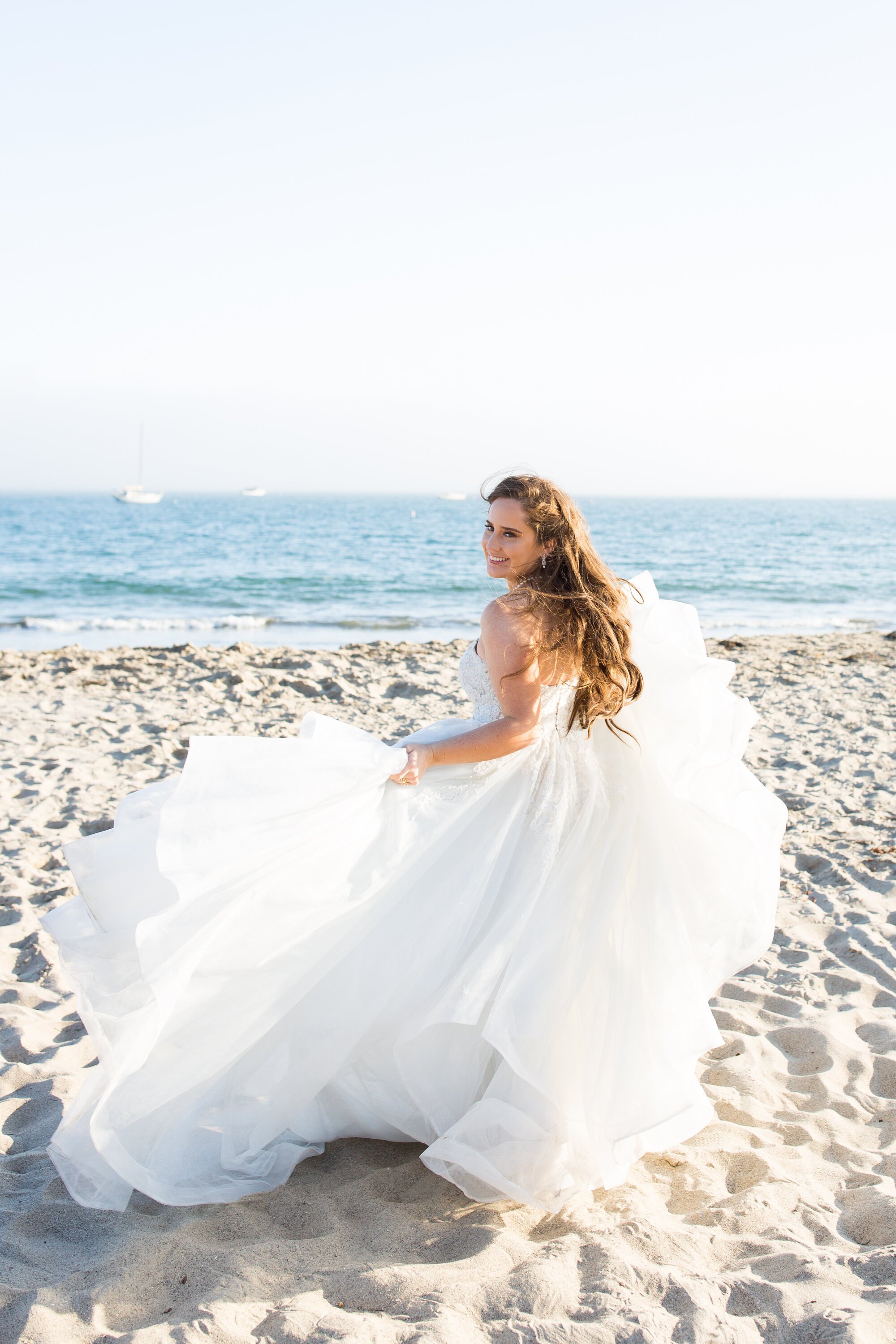 www.santabarbarawedding.com | Events by M and M | Kelsey Crews | Santa Ynez Inn | The Twisted Twig  | Jazzy McCoy-Loose | Bride Twirling on the Beach