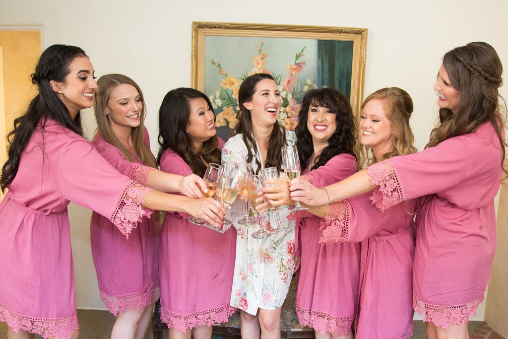 www.santabarbarawedding.com | Sarita Relis Photography | Felici Events | Rockwood Women’s Club | Alpha Floral | La Rouge Artistry | Bride with Bridesmaids in Pink Robes