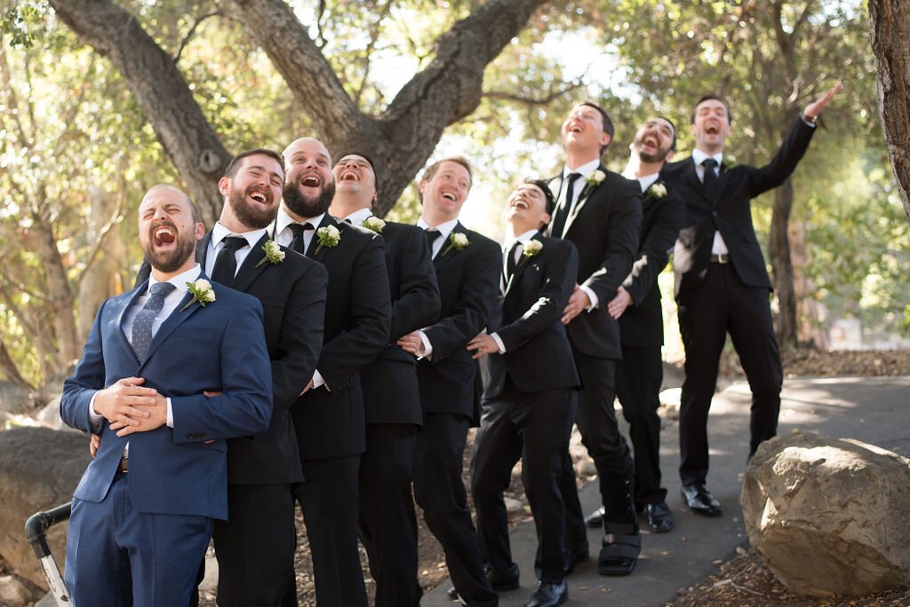 www.santabarbarawedding.com | Sarita Relis Photography | Felici Events | Rockwood Women’s Club | Alpha Floral | Groom and Groomsmen Share a Laugh During a Group Pose