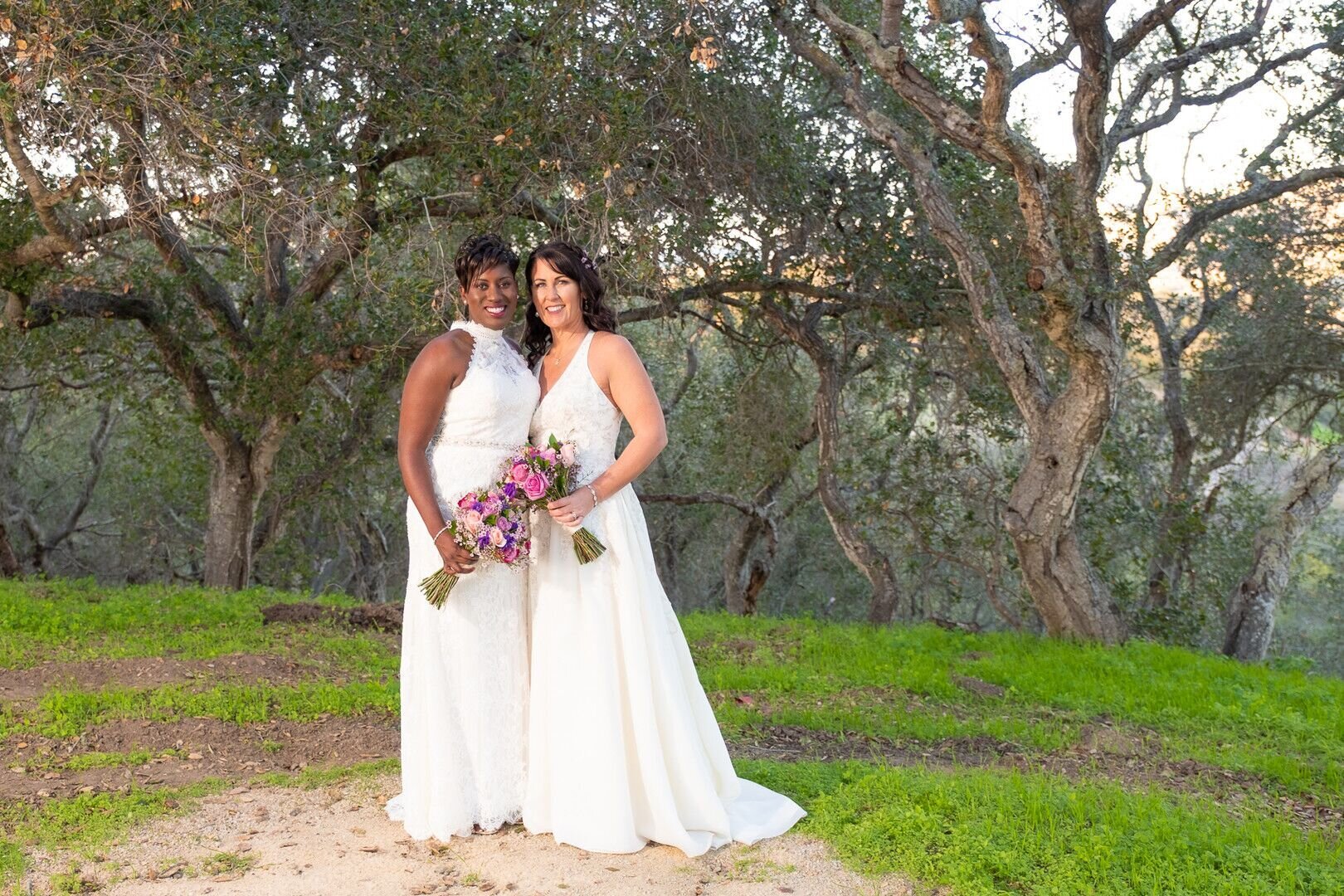 www.santabarbarawedding.com | Renoda Campbell Photography | The Casitas of Arroyo Grande | Brides Pose with Trees in the Background
