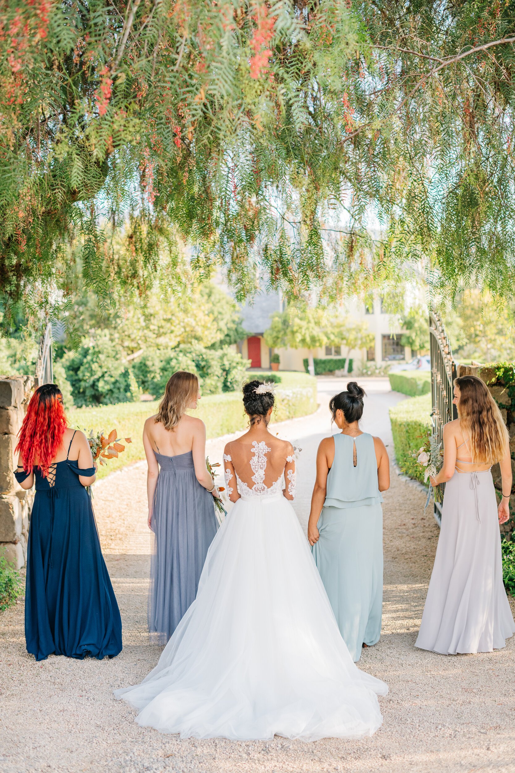 www.santabarbarawedding.com | White Sage Wedding &amp; Events | Cara Robbins Studio | Rogue Styling | Ojala Floral | Back of Bride’s and Bridesmaids’ Dresses