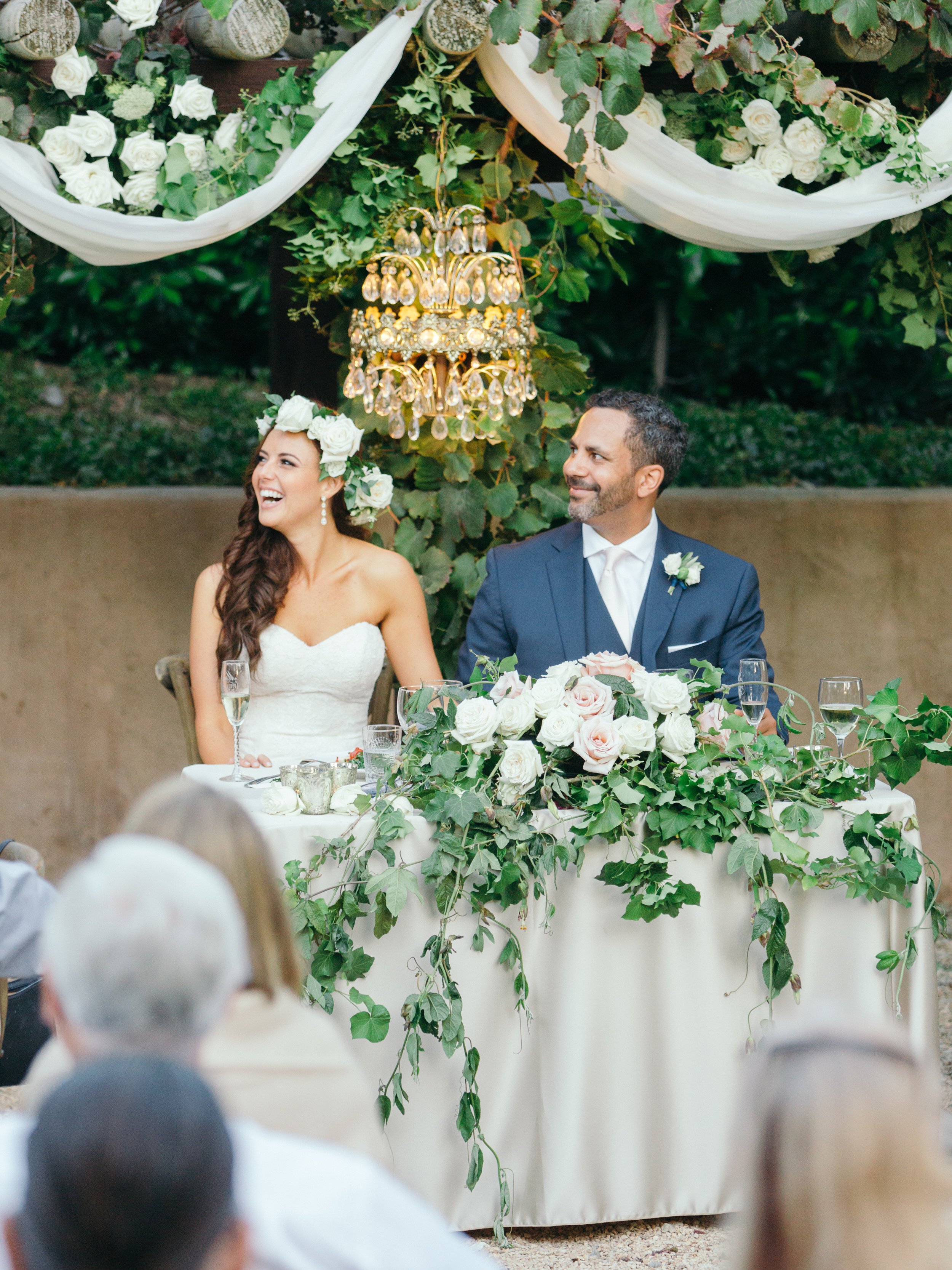 www.santabarbarawedding.com | Ella &amp; Louie | Kiel Rucker | White and Blush Flowers at the Bride and Groom’s Reception Table and a Flower Crown for the Bride
