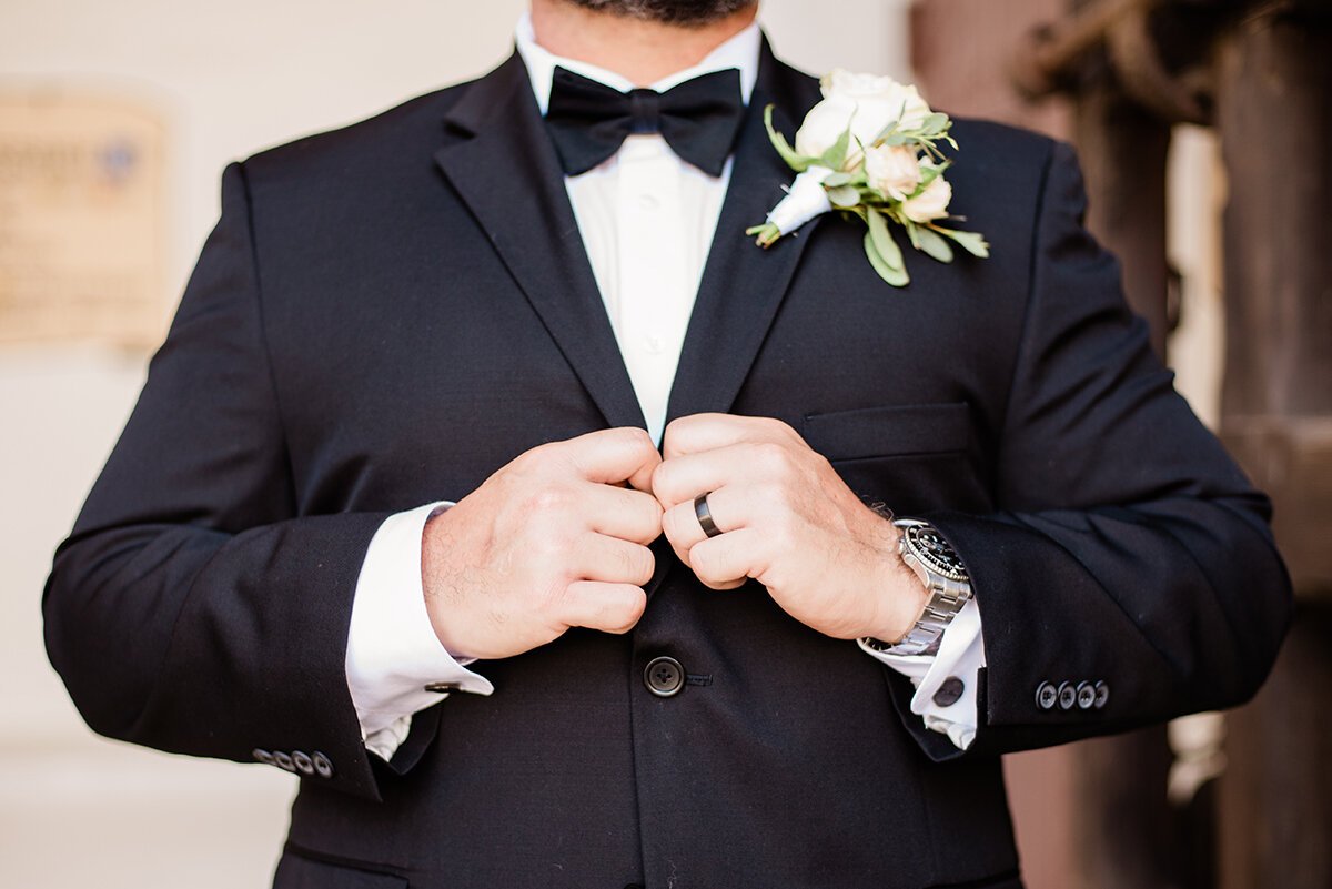 www.santabarbarawedding.com | ByCherry Photography | Belmond El Encanto | Hogue Floral | Groom Buttoning His Tuxedo