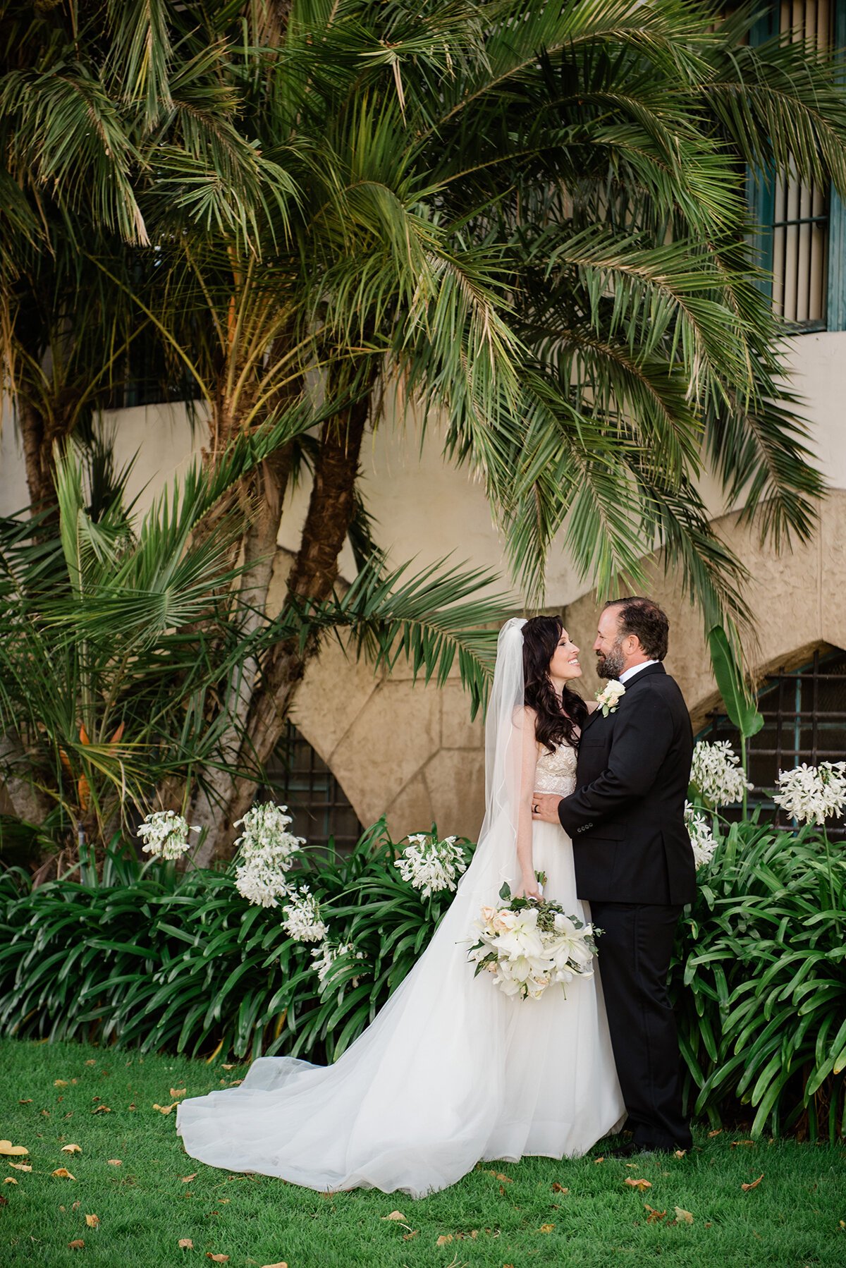 www.santabarbarawedding.com | ByCherry Photography | Santa Barbara Courthouse | Hogue Floral | Santa Barbara Hair &amp; Makeup | Bride and Groom Share a Moment After the Ceremony 