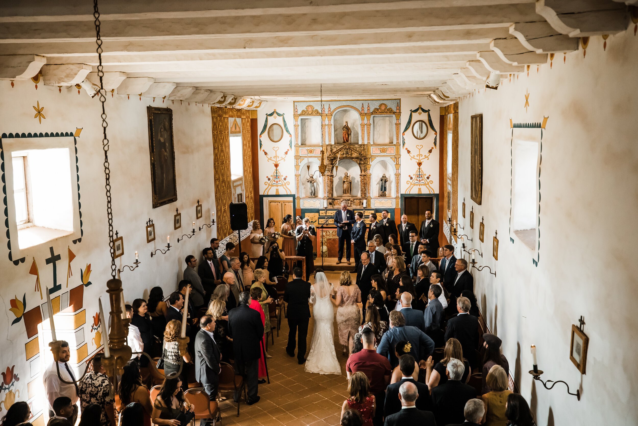 www.santabarbarawedding.com | Michelle Ramirez Photography | The Presidio Chapel | Events by Maxi | indoor chapel wedding ceremony 