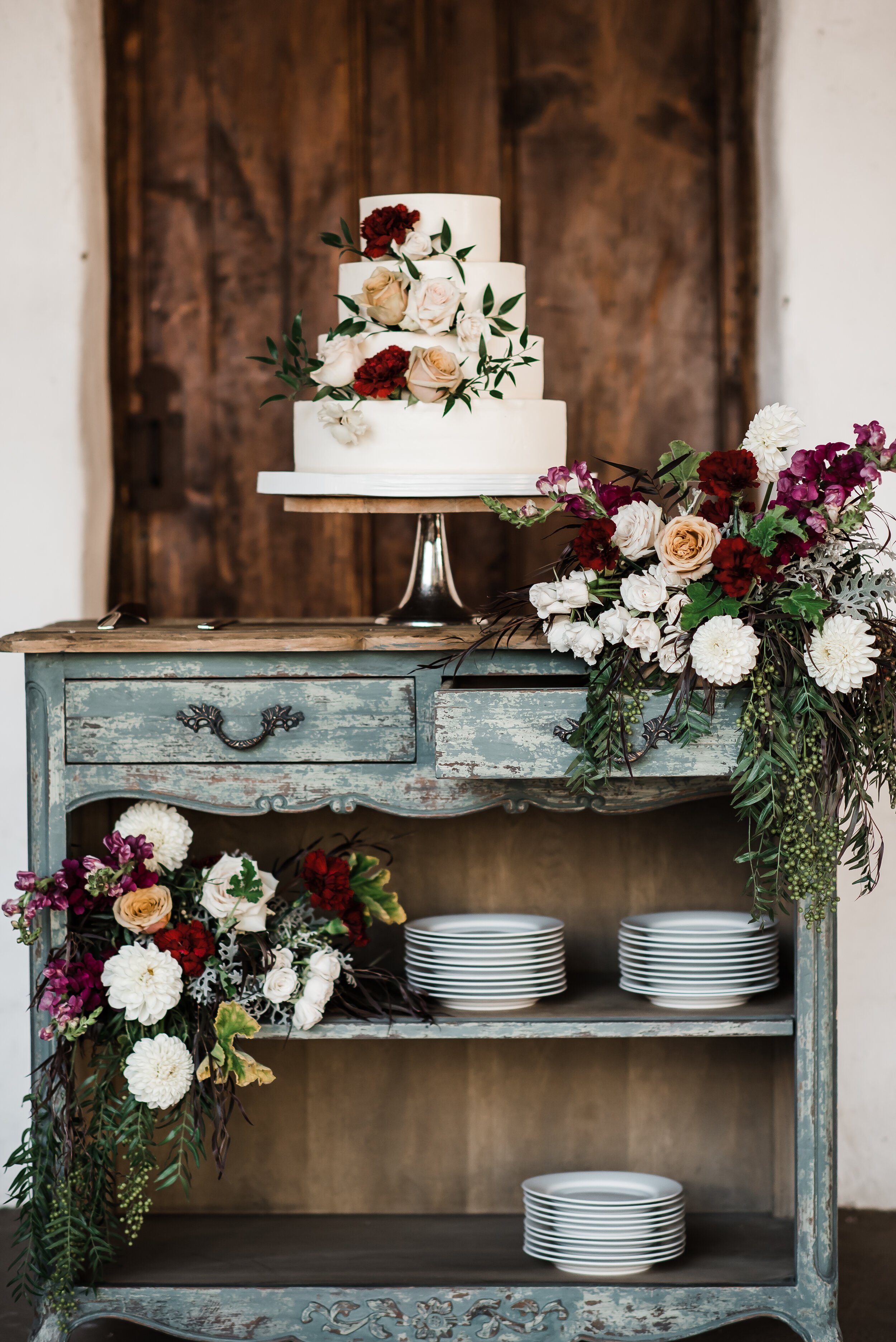 www.santabarbarawedding.com | Michelle Ramirez Photography | Casa De La Guerra | Events by Maxi | The Tent Merchant | Alexis Ireland Florals | Lilac Patisserie | floral white wedding cake