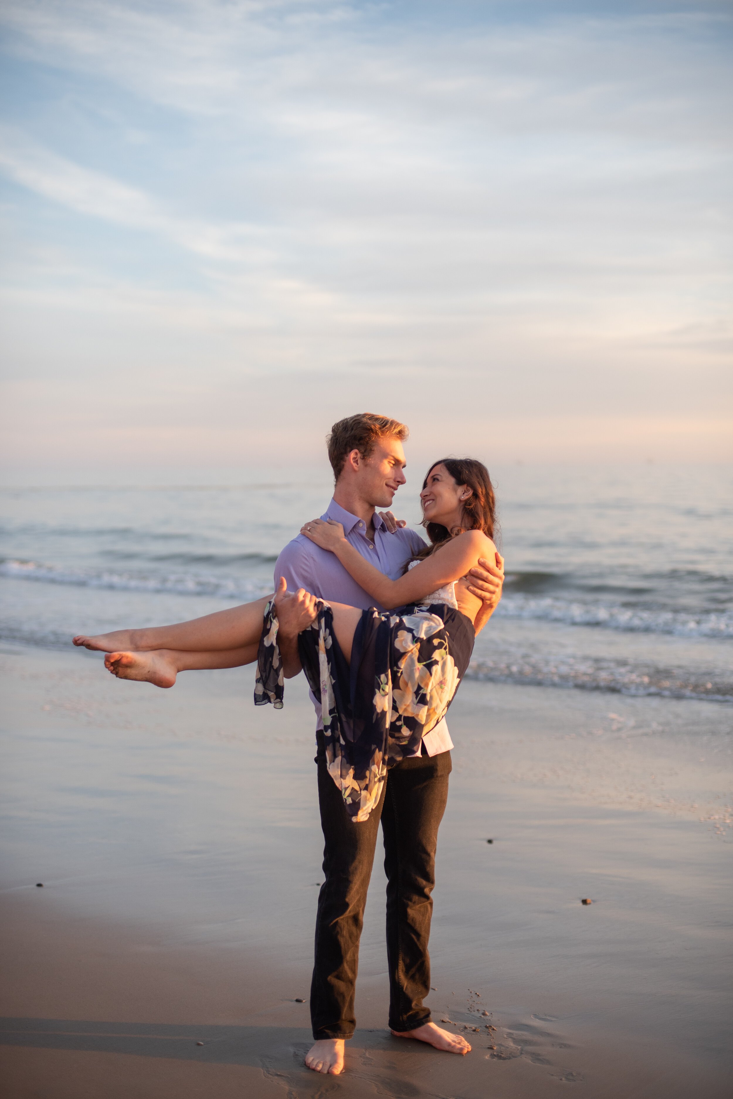 www.santabarbarawedding.com | ByCherry Photography | Butterfly Beach | Groom-to-Be Holding His Bride-to-be on the Beach