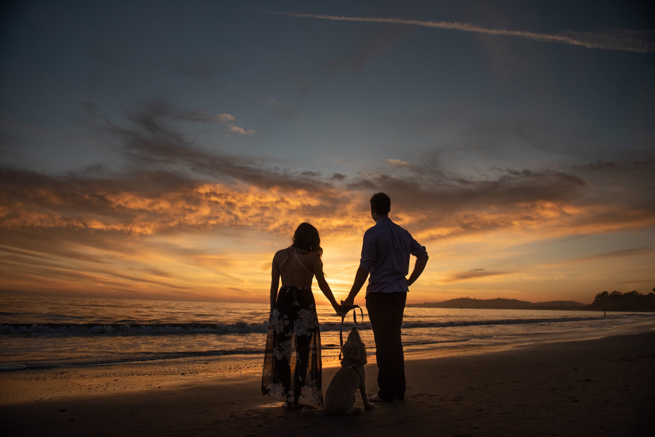 www.santabarbarawedding.com | ByCherry Photography | Butterfly Beach | Couple and Their Dog on the Beach at Sunset