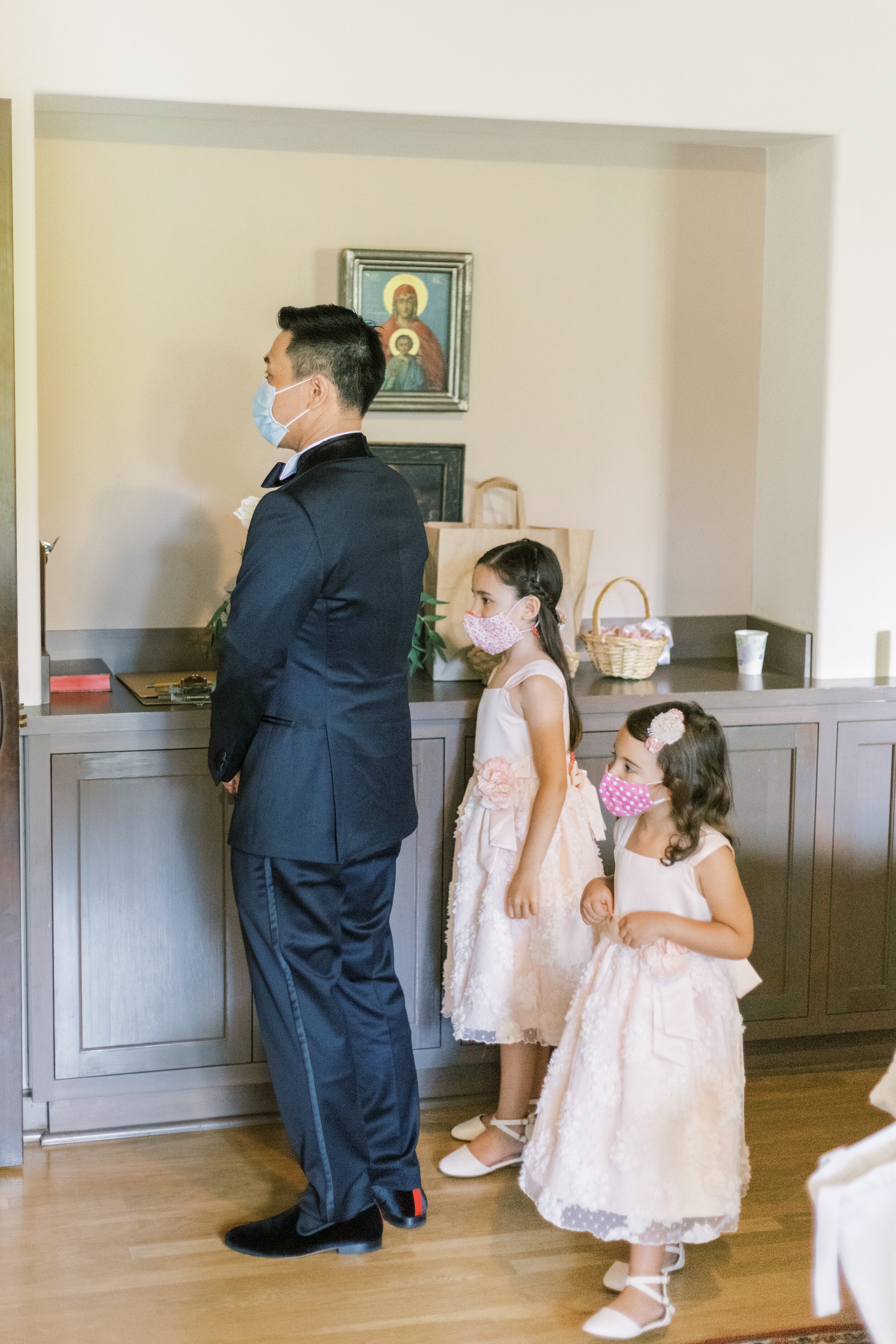 www.santabarbarawedding.com | Jocelyn &amp; Spencer | El Montecito Presbyterian Church | Indochino | Groom Getting Ready with Two Little Girls in Pink