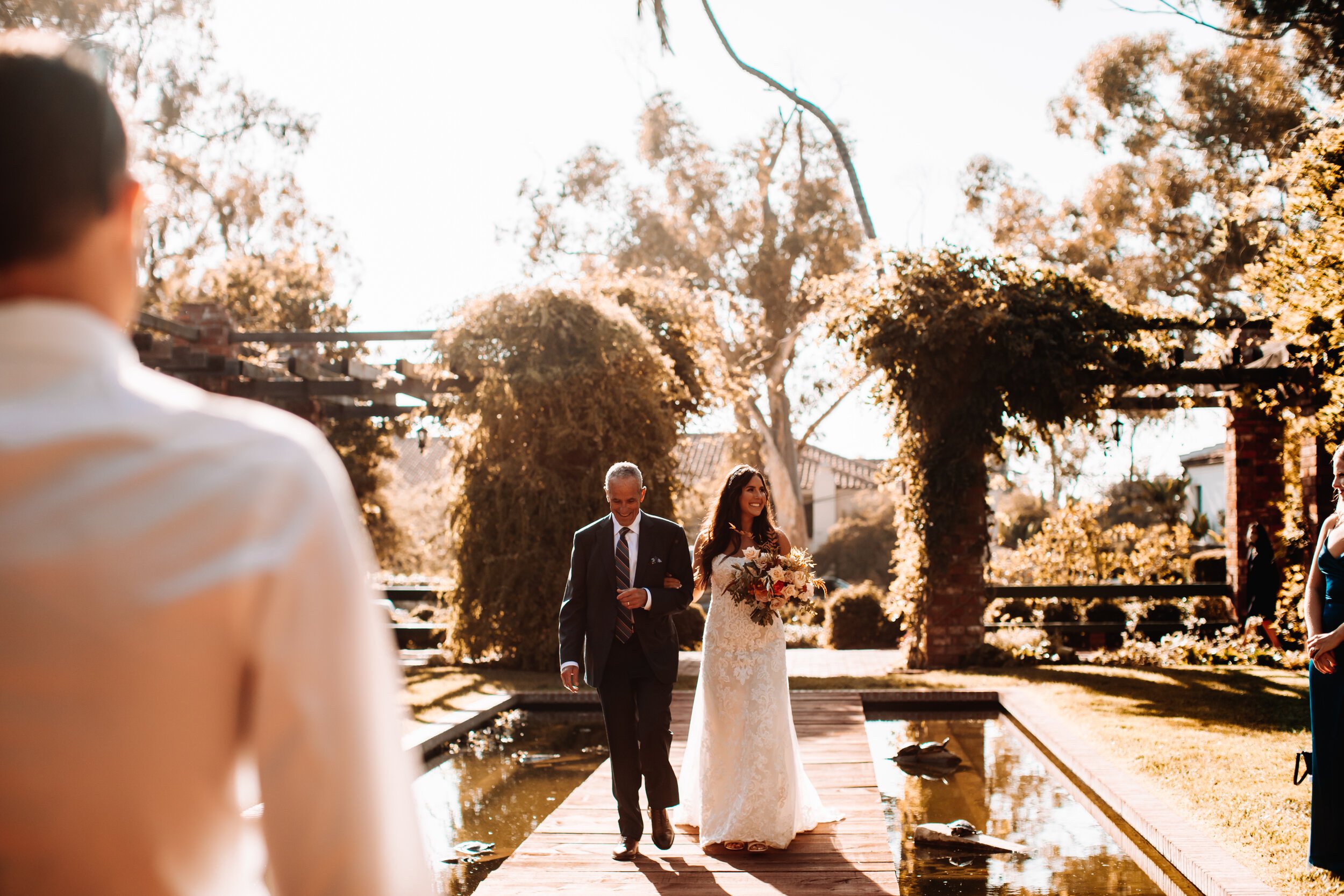 www.santabarbarawedding.com | Brandon Colbert Photography | Belmond El Encanto | Santa Barbara Elopement | TEAM Hair &amp; Makeup | Margaret Joan Florals | Bride Walking Down the Aisle with Father