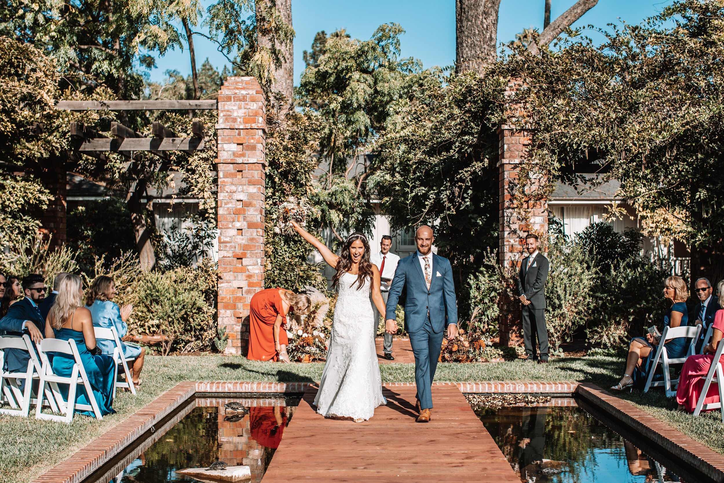 www.santabarbarawedding.com | Brandon Colbert Photography | Belmond El Encanto | Santa Barbara Elopement | TEAM Hair &amp; Makeup | Margaret Joan Florals | Bride and Groom Leaving the Ceremony 