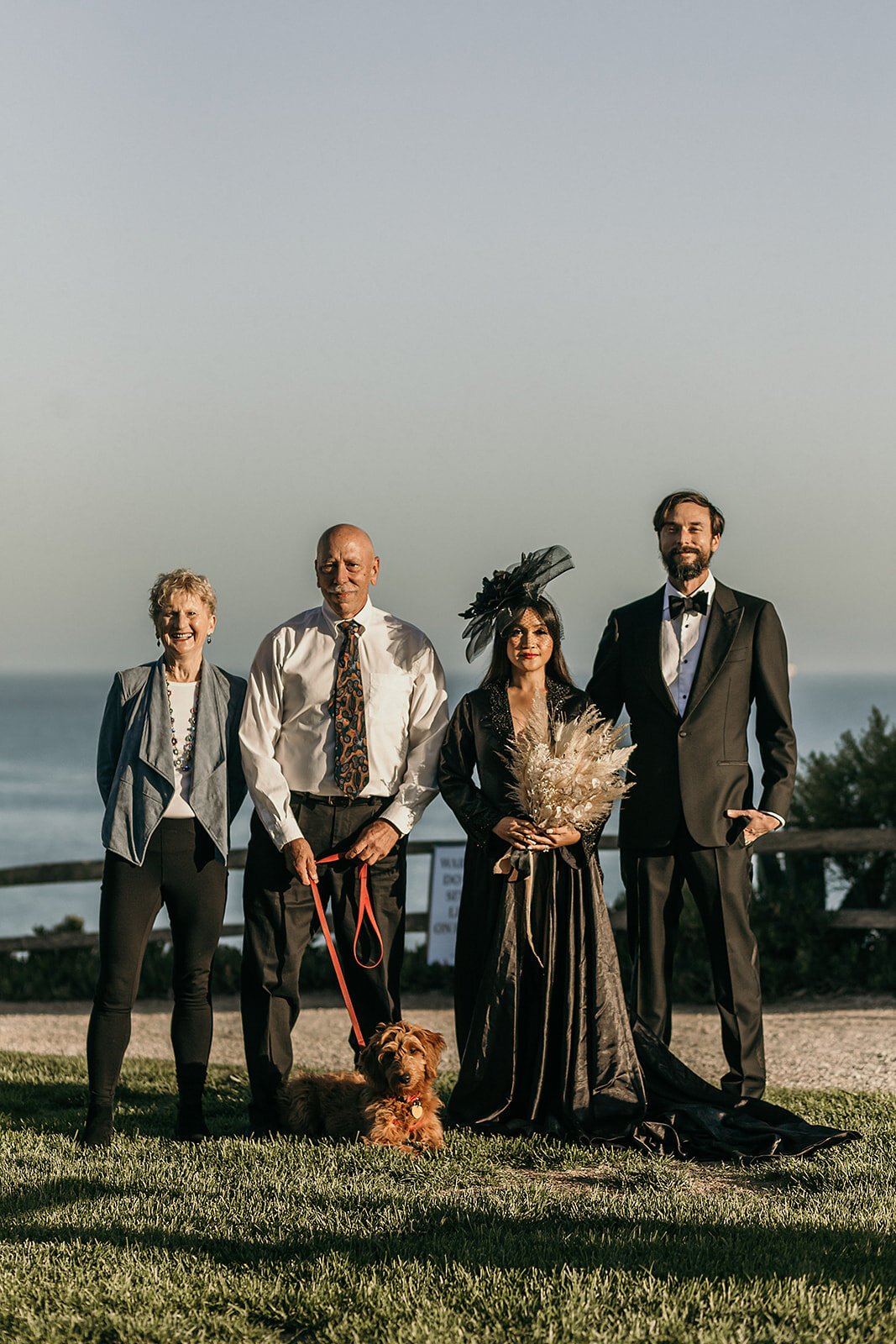 www.santabarbarawedding.com | Sarah Vendramini | The Ritz-Carlton Bacara | Lobo Floral | Mark Patterson | The Couple with Parents and Dog by The Ocean