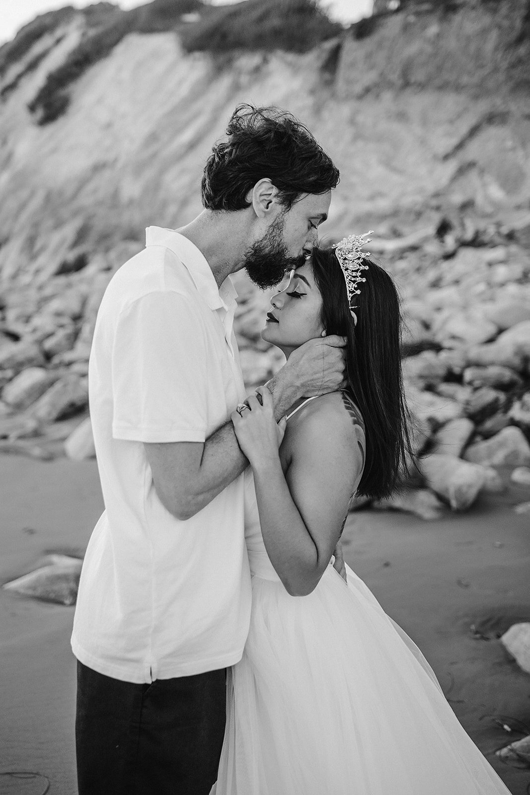www.santabarbarawedding.com | Sarah Vendramini | The Ritz-Carlton Bacara | Lobo Floral | Mark Patterson | Bride and Groom Embrace on the Beach