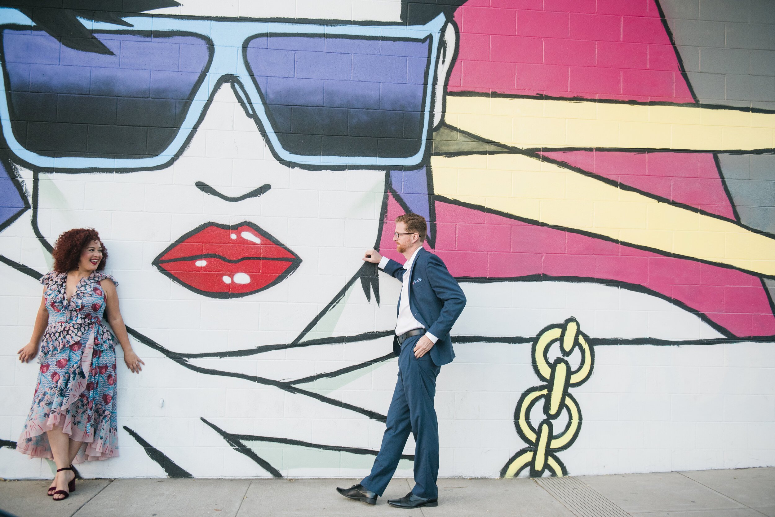 www.santabarbarawedding.com | ByCherry Photography | The Funk Zone | The Couple in Front of a Graffiti Wall Background