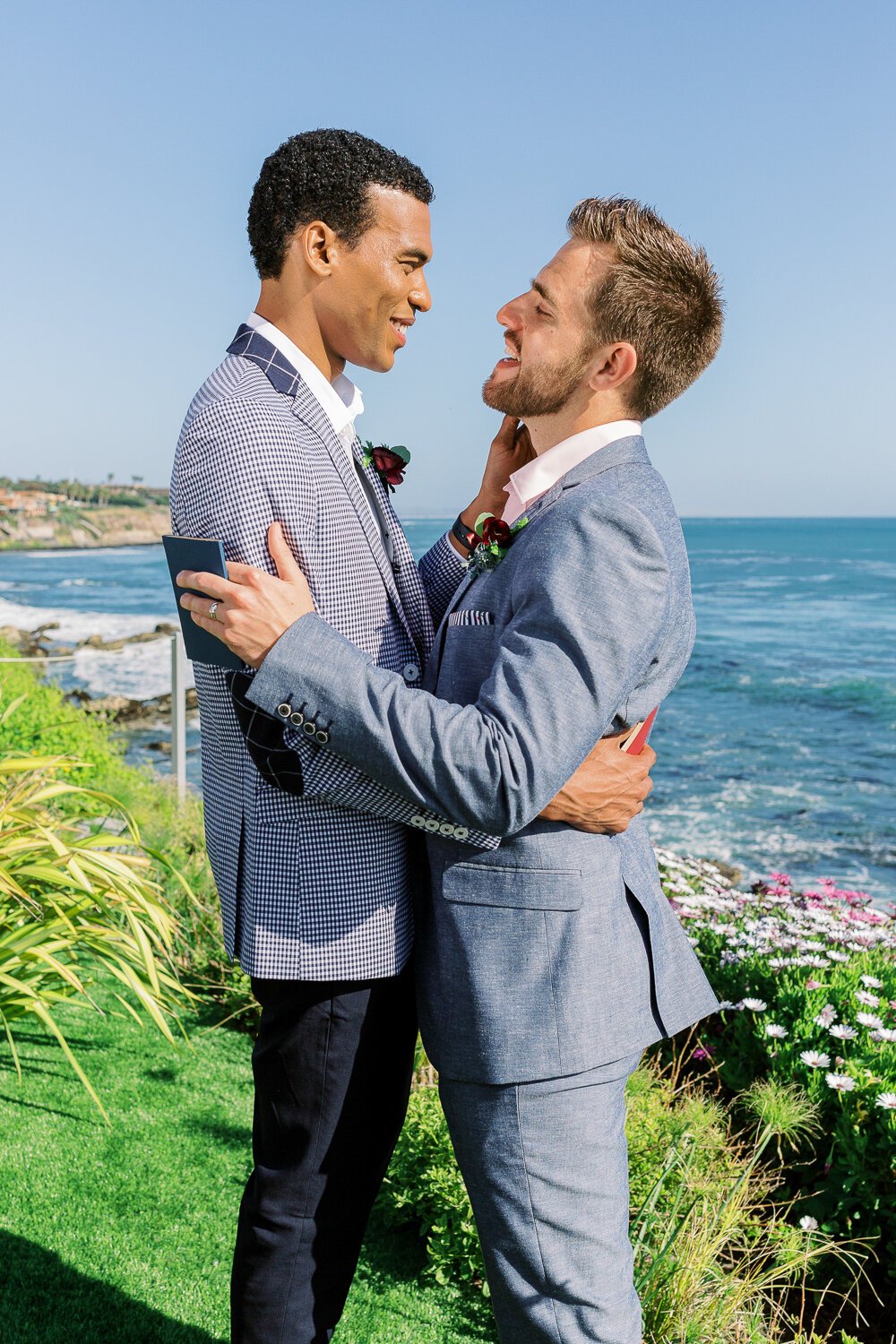 www.santabarbarawedding.com | Renoda Campbell Photography | Renoda Campbell Events | Men’s Wearhouse | Flourish Event &amp; Floral Design | Grooms Embrace by the Ocean