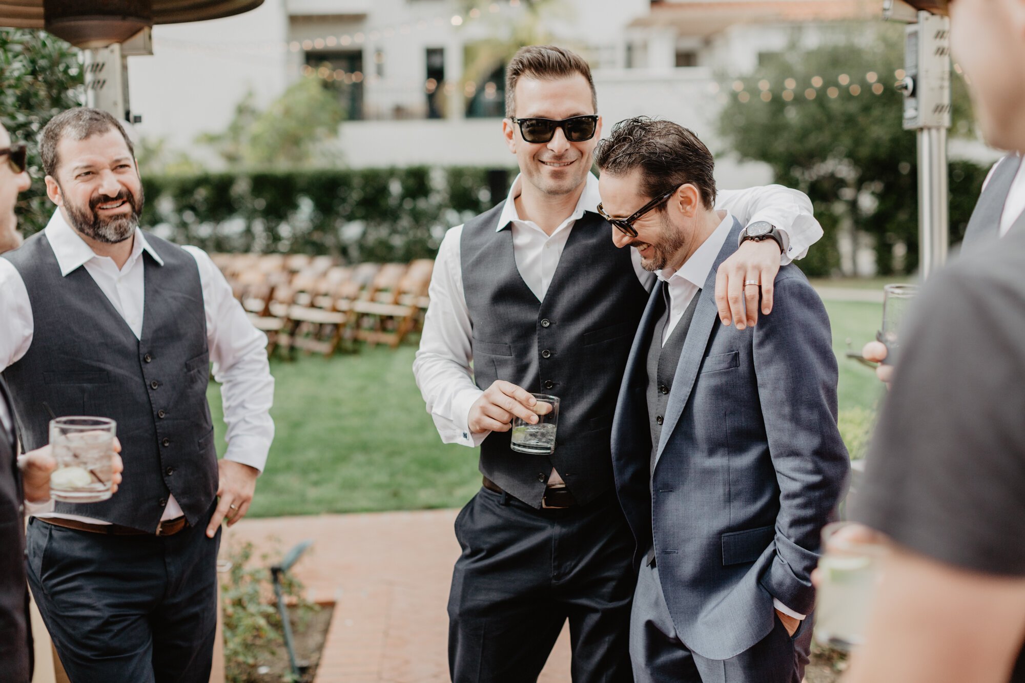 www.santabarbarawedding.com | Kyle London Photography | Santa Barbara Club | Groom Having a Drink with Groomsmen Before Ceremony 