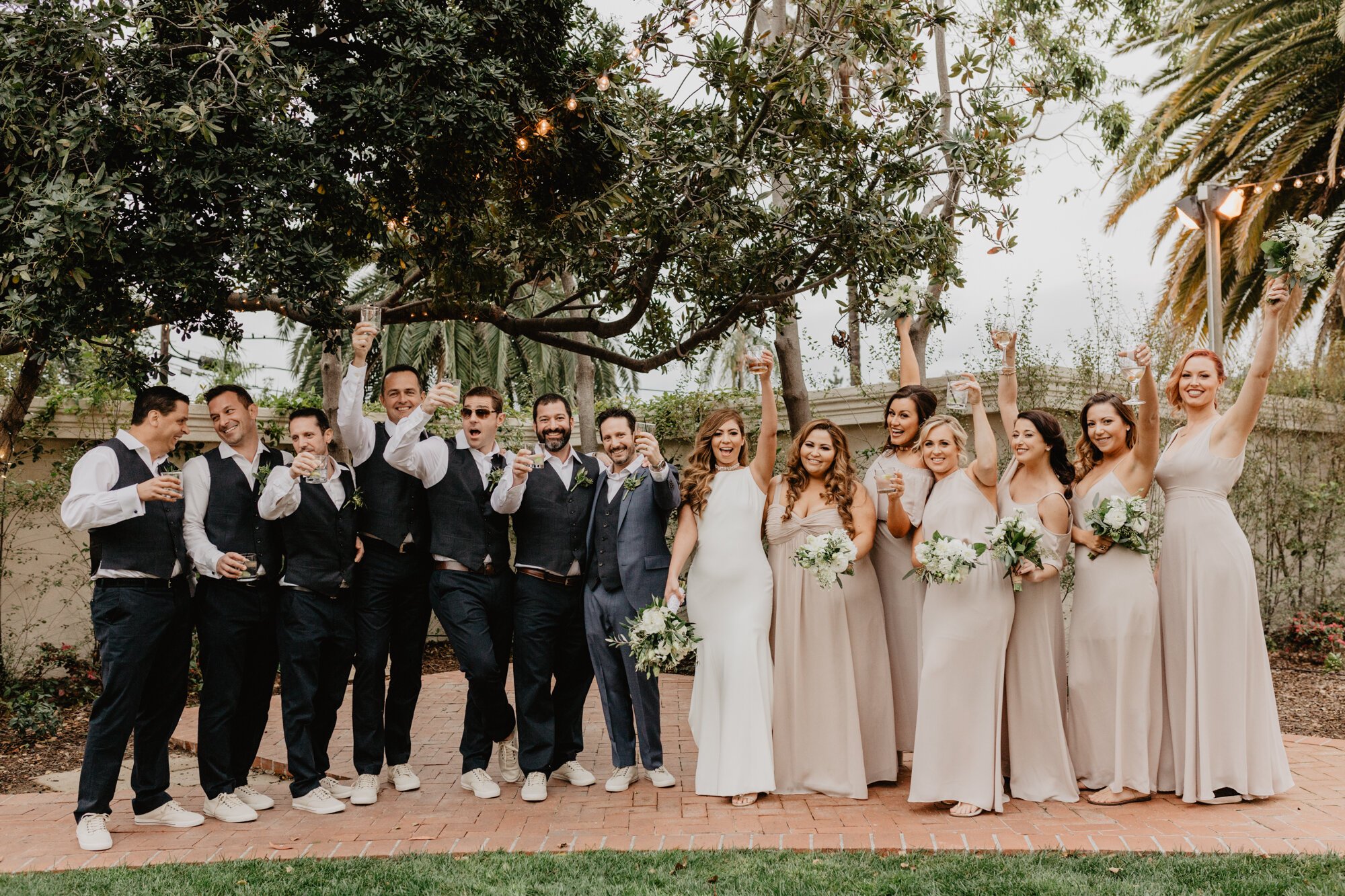 www.santabarbarawedding.com | Kyle London Photography | Santa Barbara Club | Sweet Pea Flowers | Theia | Moondance Bridal | The Wedding Party Celebrates Following the Ceremony 