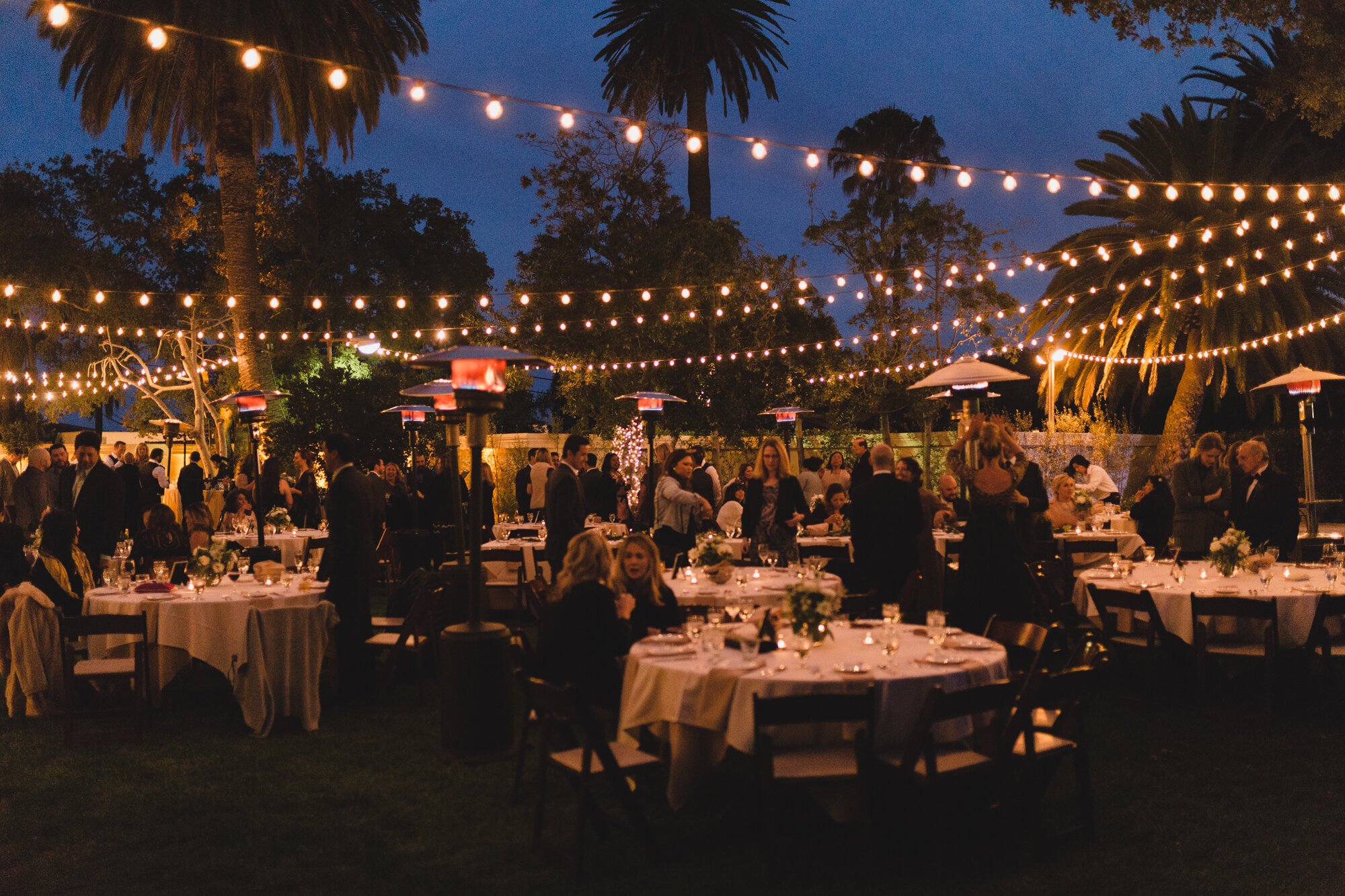 www.santabarbarawedding.com | Kyle London Photography | Santa Barbara Club | Sweet Pea Flowers | DJ Hecktik | The Reception Under String Lights