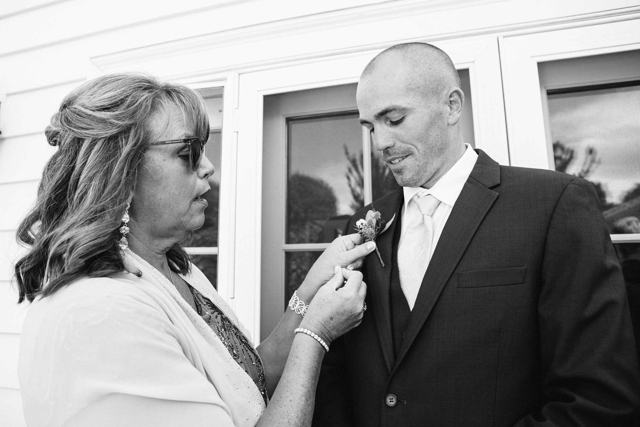 www.santabarbarawedding.com | ByCherry Photography | Floral Designs by Roni | Groom’s Mom Helps Pin His Boutonniere 