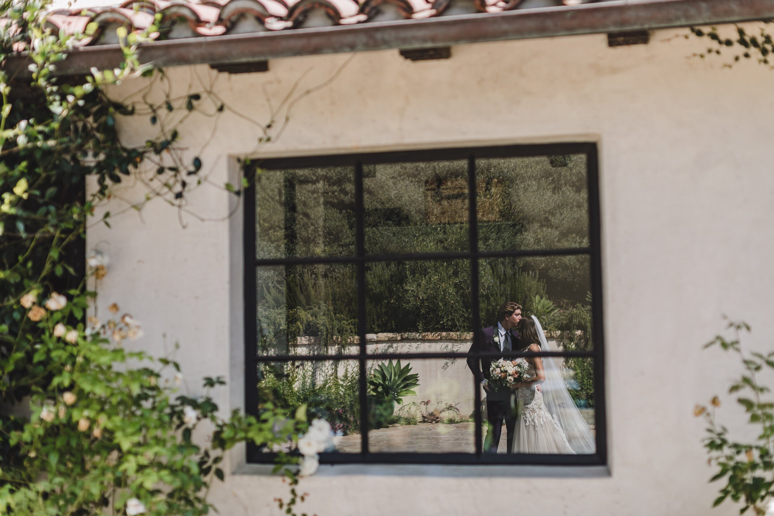 www.santabarbarawedding.com | Klentner Ranch | Santa Barbara Wedding Coordinator | Waller Weddings | The Twisted Twig | Couple’s Reflection in the Window