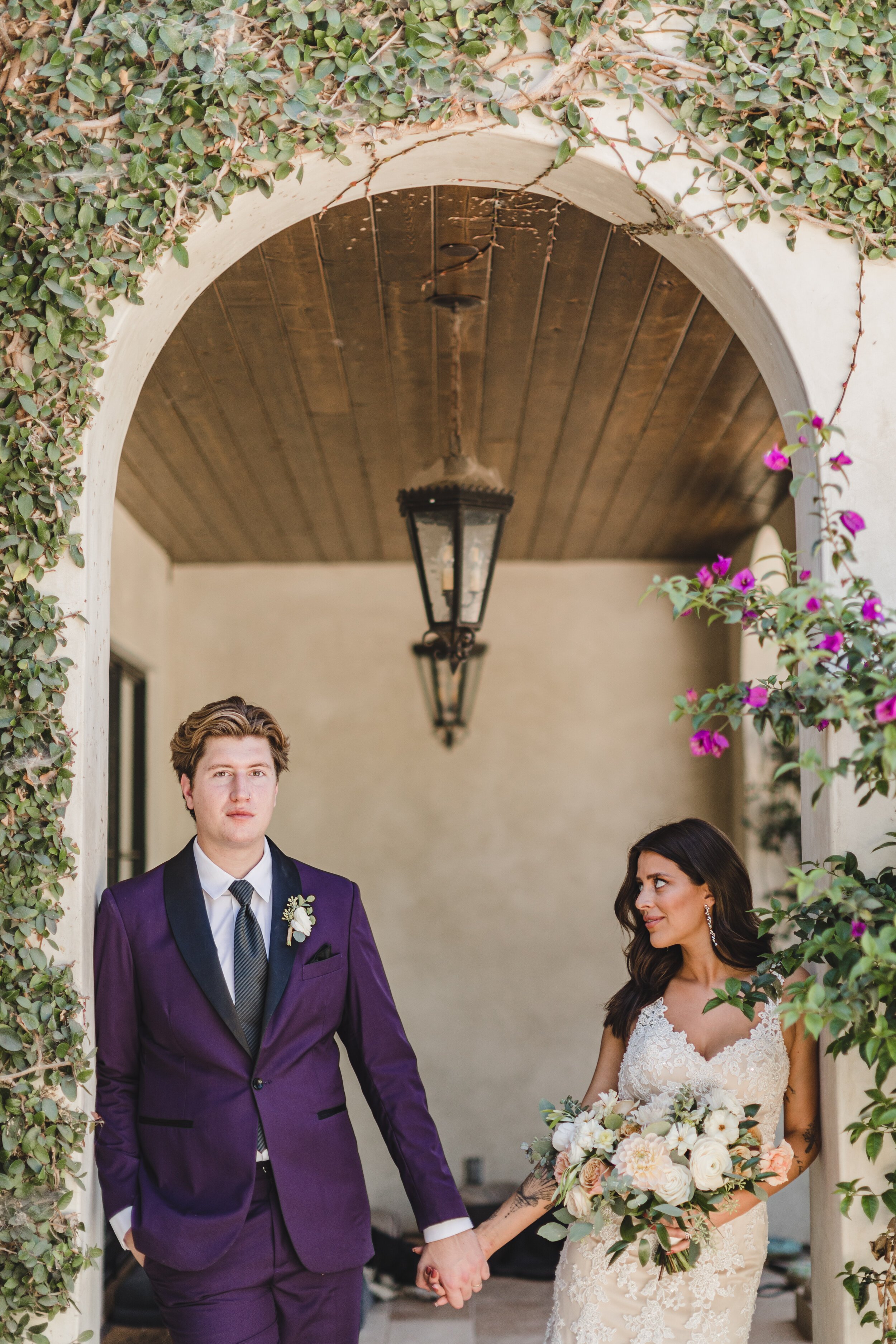 www.santabarbarawedding.com | Klentner Ranch | Santa Barbara Wedding Coordinator | Waller Weddings | The Twisted Twig | Bride and Groom Under the Venue's Arch