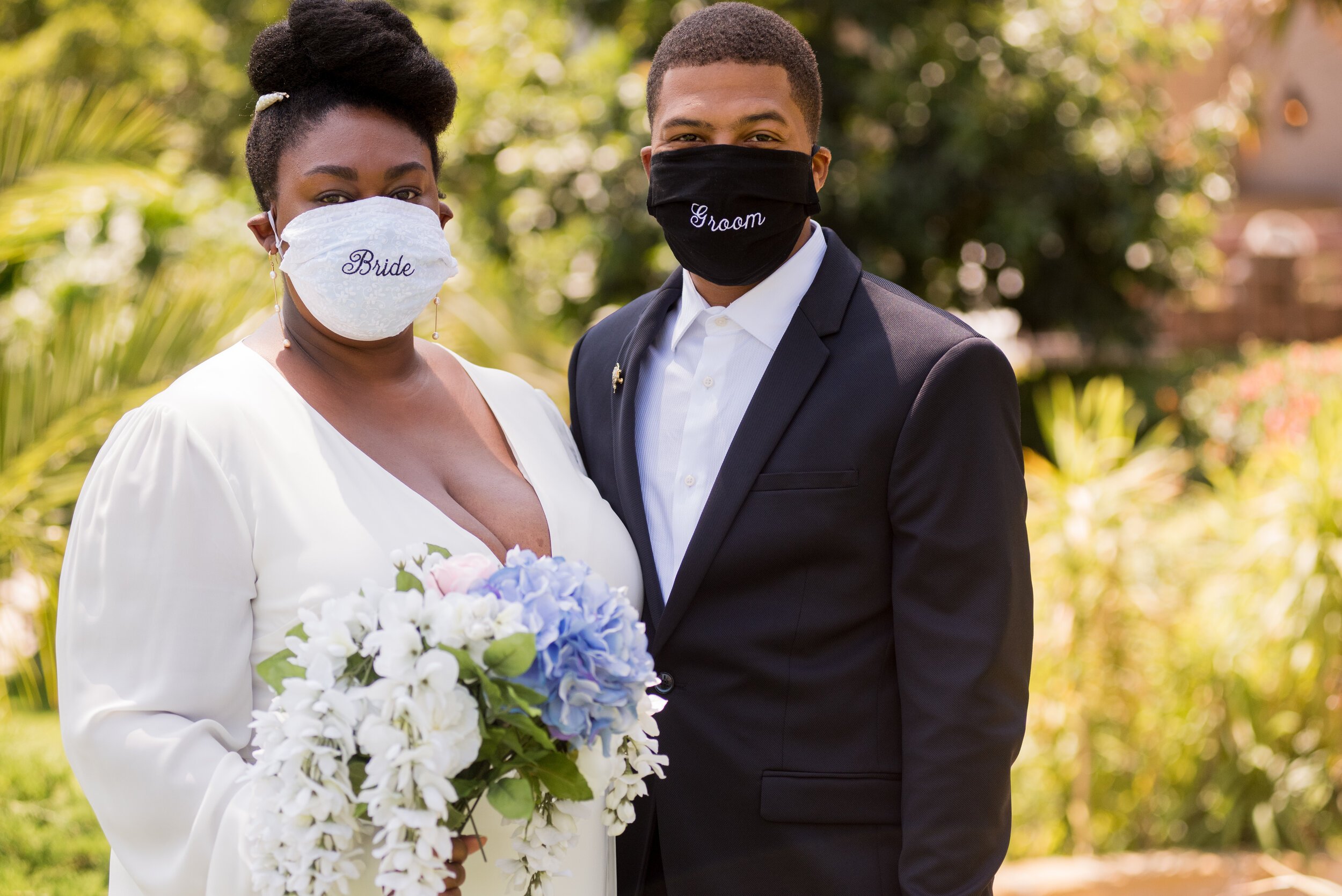 www.santabarbarawedding.com | ByCherry Photography | Santa Barbara Courthouse | Bride and Groom Outside the Courthouse with Their Masks On