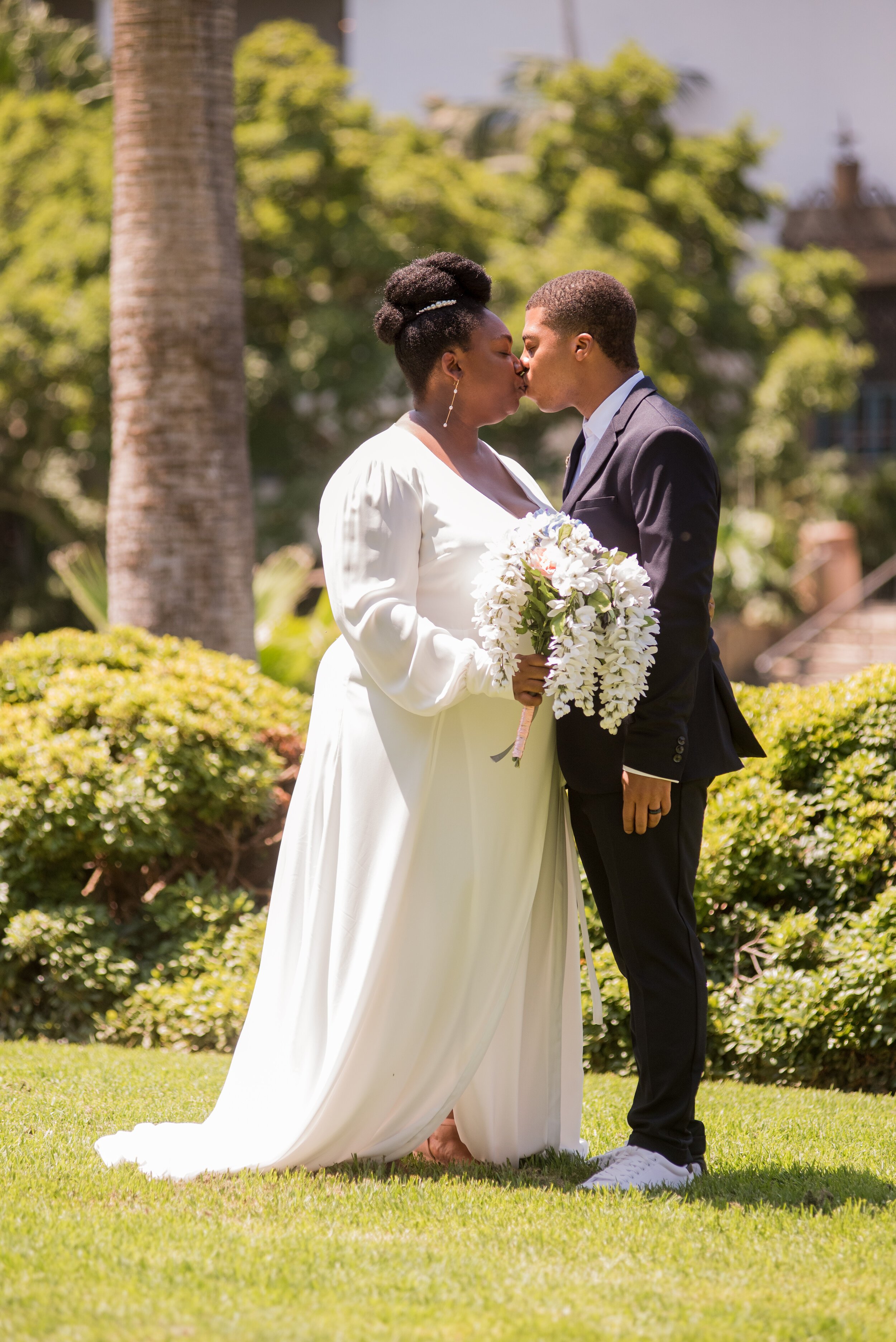 www.santabarbarawedding.com | ByCherry Photography | Santa Barbara Courthouse | Bride and Groom Share a Kiss