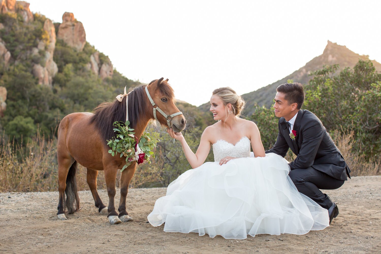www.santabarbarawedding.com | APEX Malibu | Elizabeth Victoria Photography | Ebeling Events | Flowers by Maria | BHLDN | Malibu Clothes | Bride and Groom with Pony