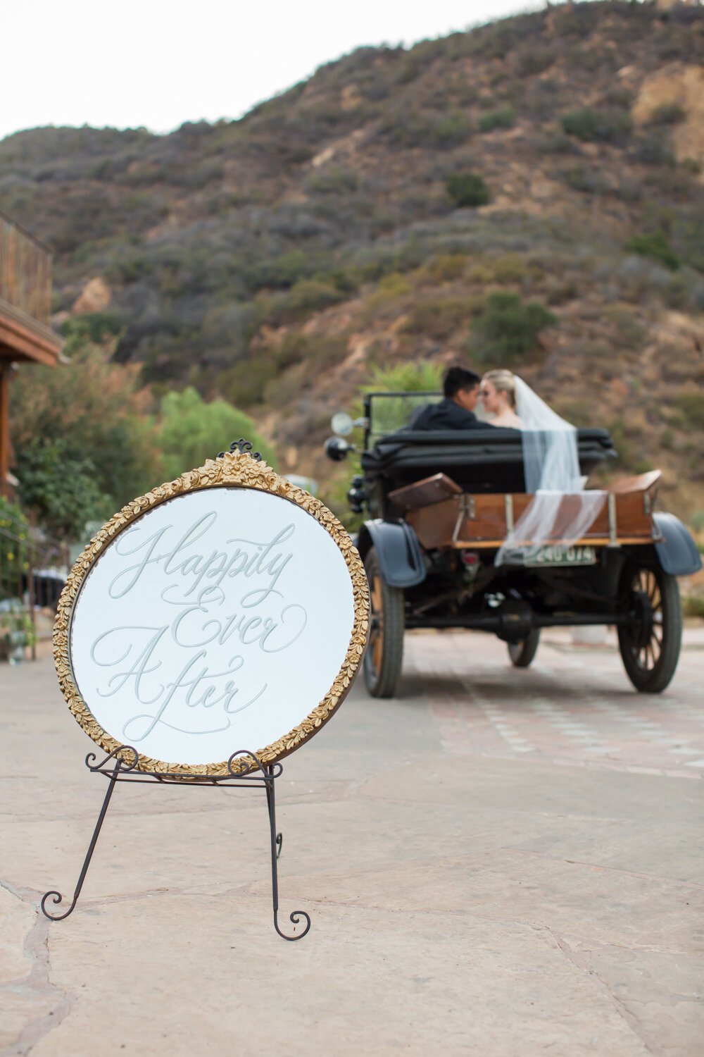 www.santabarbarawedding.com | APEX Malibu | Elizabeth Victoria Photography | Ebeling Events | Amigo Party Rentals | Kristina Virtue Designs | Sign and Couple in Vintage Car
