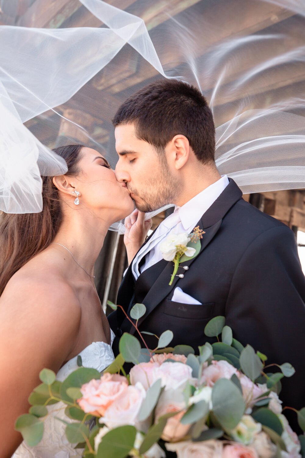 www.santabarbarawedding.com | Kiernan Michelle Photography | Stearns Wharf | Sohi Productions | Bride and Groom Kiss Under Veil