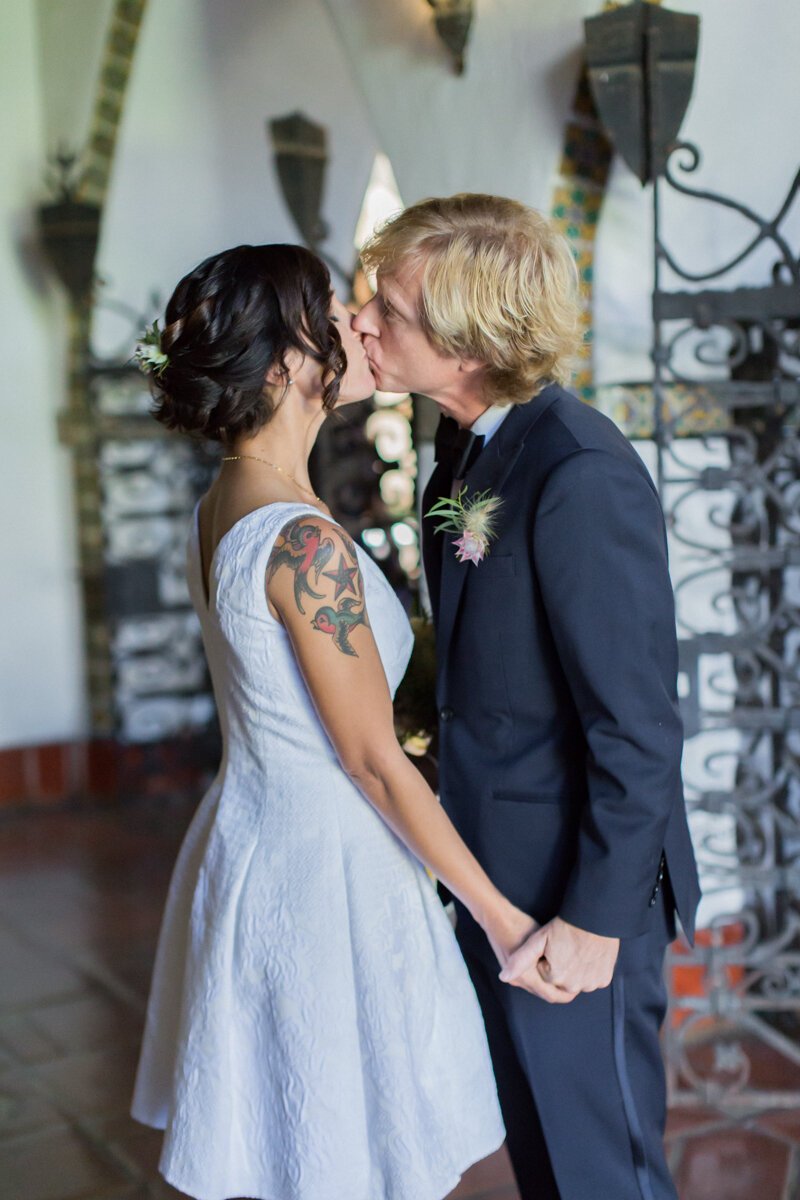 www.santabarbarawedding.com | Aurelia D’Amore Photography | Santa Barbara Courthouse | Haute Blossoms Floral | Alice and Olivia | Bride and Groom’s Share a Kiss