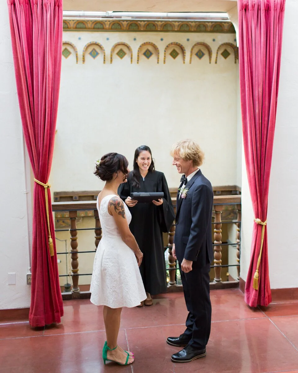 www.santabarbarawedding.com | Aurelia D’Amore Photography | Santa Barbara Courthouse | Haute Blossoms Floral | Alice and Olivia | Bride and Groom During Ceremony 
