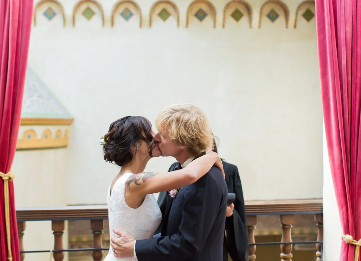 www.santabarbarawedding.com | Aurelia D’Amore Photography | Santa Barbara Courthouse | Haute Blossoms Floral | Alice and Olivia | Bride and Groom First Kiss