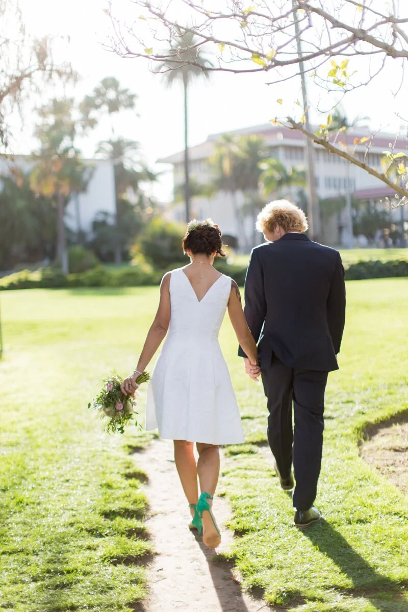 www.santabarbarawedding.com | Aurelia D’Amore Photography | Santa Barbara Courthouse | Haute Blossoms Floral | Alice and Olivia | Bride and Groom Walk Outside After the Ceremony 