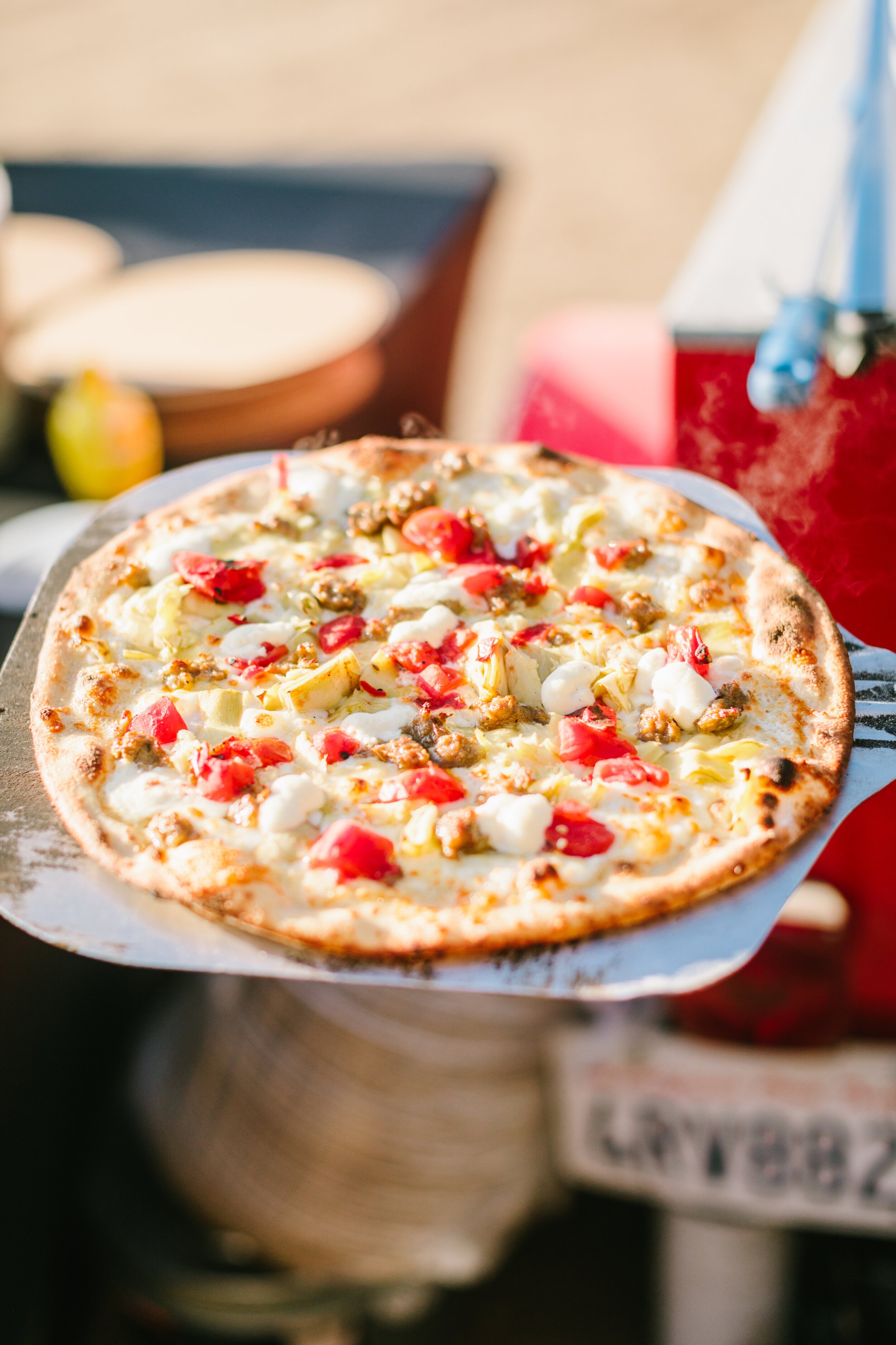 www.santabarawedding.com | Firefly Pizza Company | Jodee Debes Photography | Sausage, Cheese, and Tomato Pizza