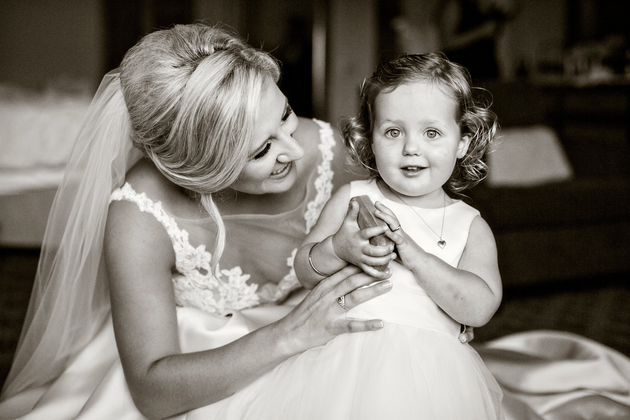www.santabarbarawedding.com | Laurie Bailey Photography | Ojai Valley Inn | Amber Weir Wedding &amp; Events | Luna Bella | The Bride and Flower Girl Share a Sweet Moment