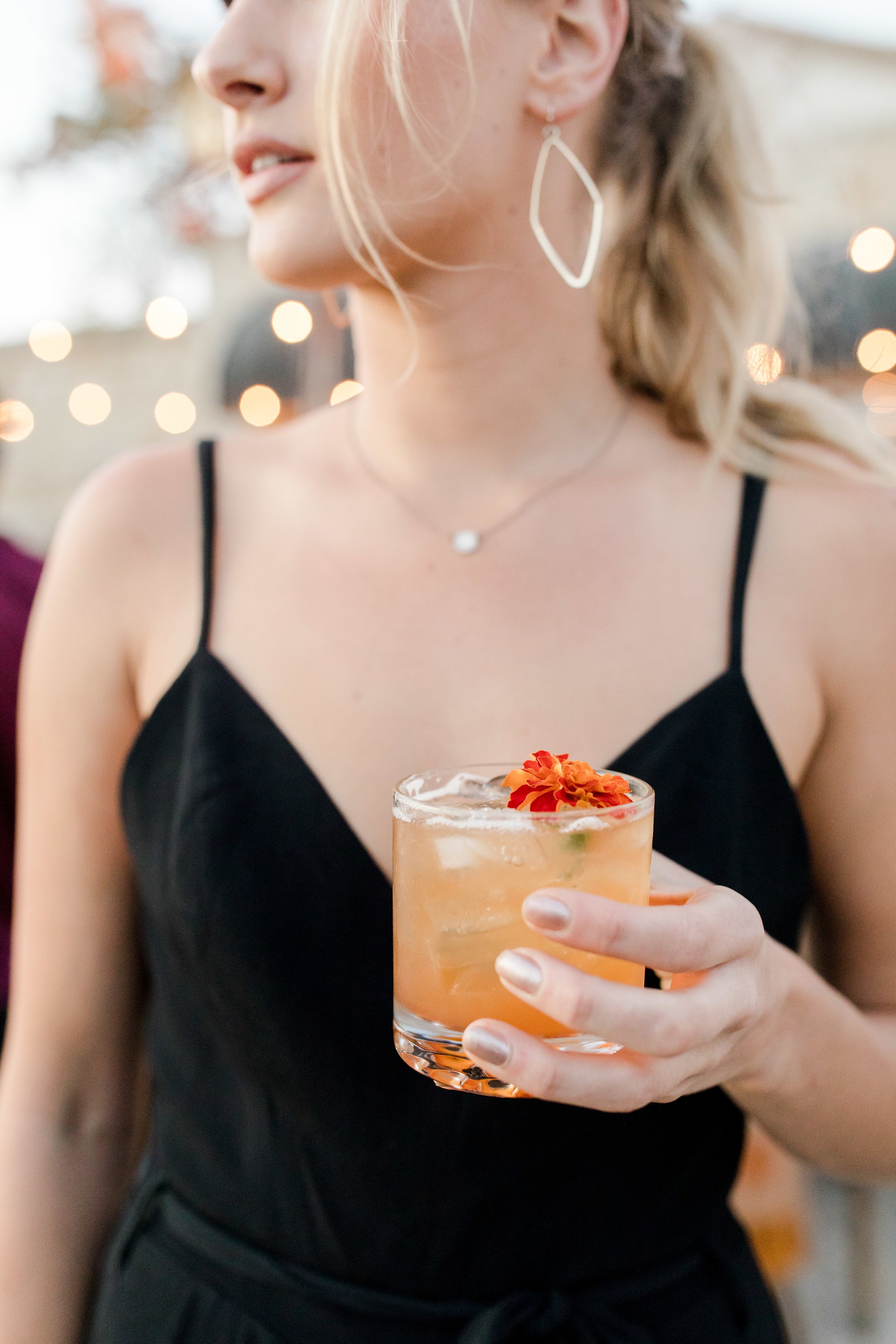 www.santabarbarawedding.com | Flair Project | Guest with Cocktail at Fall Fete Dinner